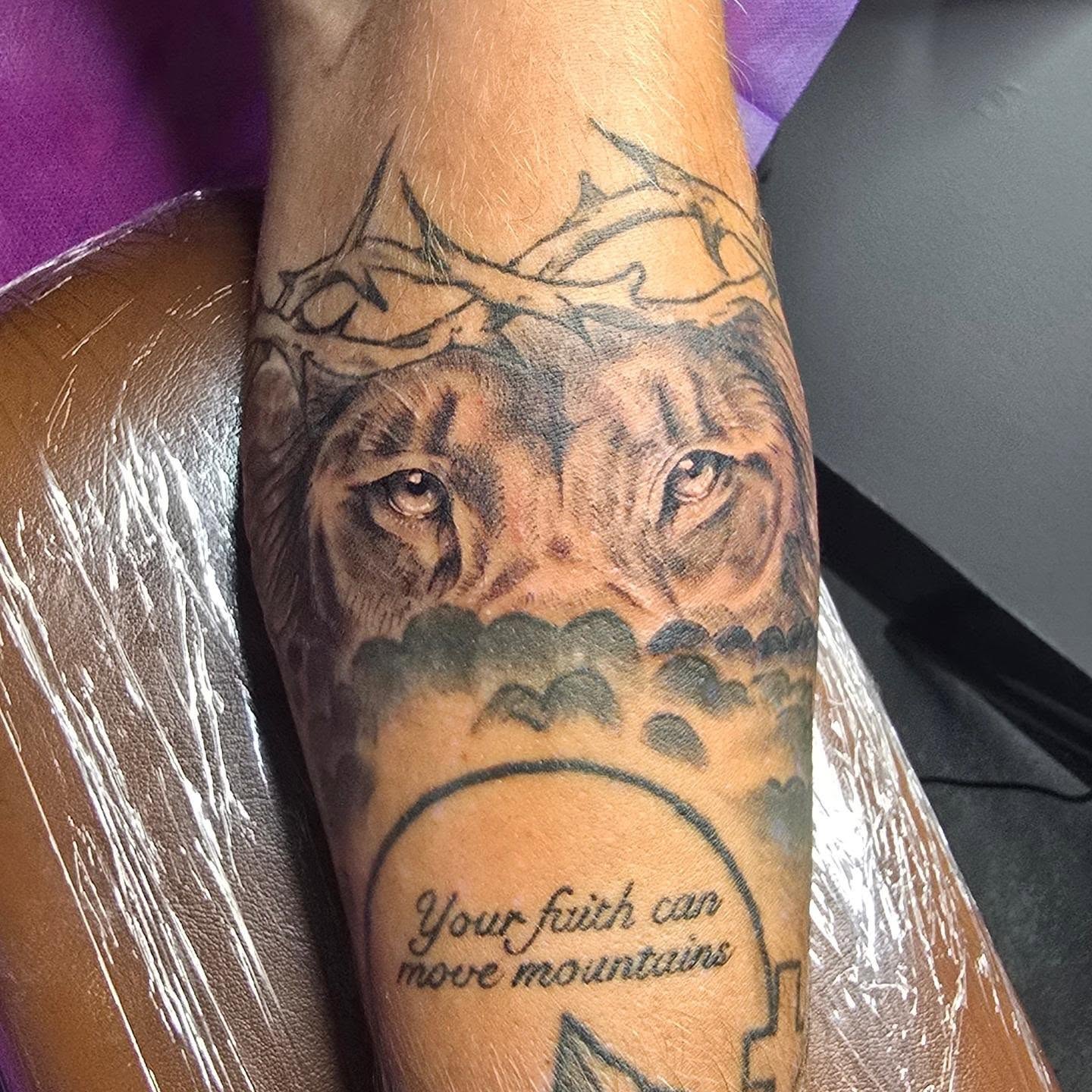 Lion realism tattoo on the forearm by Val Sanchez