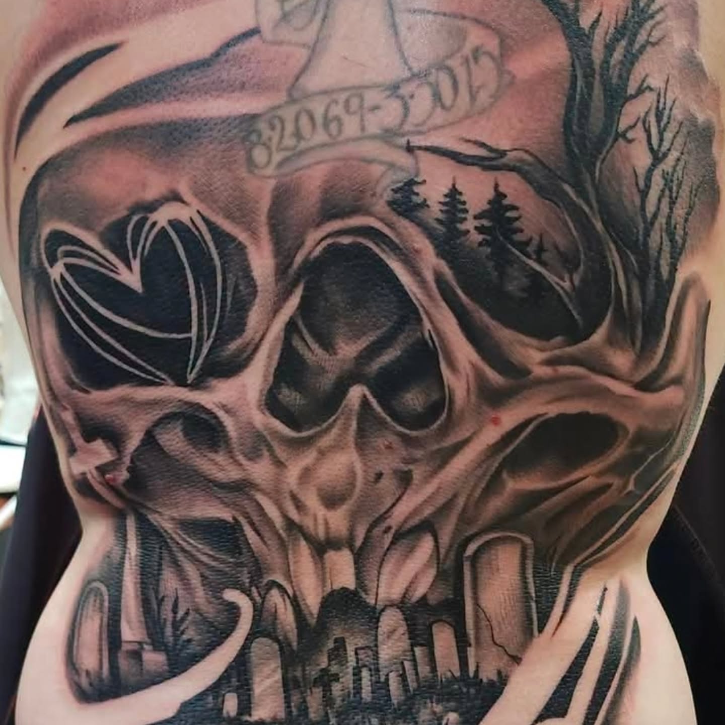 Skull realism tattoo on the ribs by Chris Wodarski