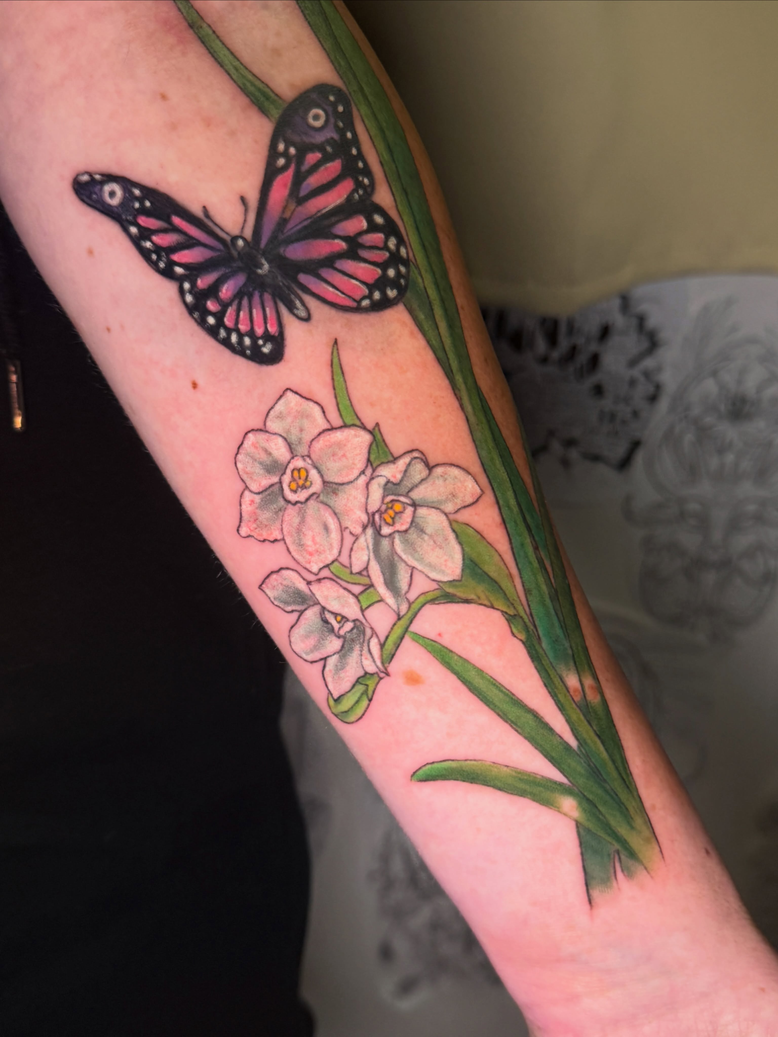 Butterfly and flowers realism tattoo on the forearm by ❈°binx°❈