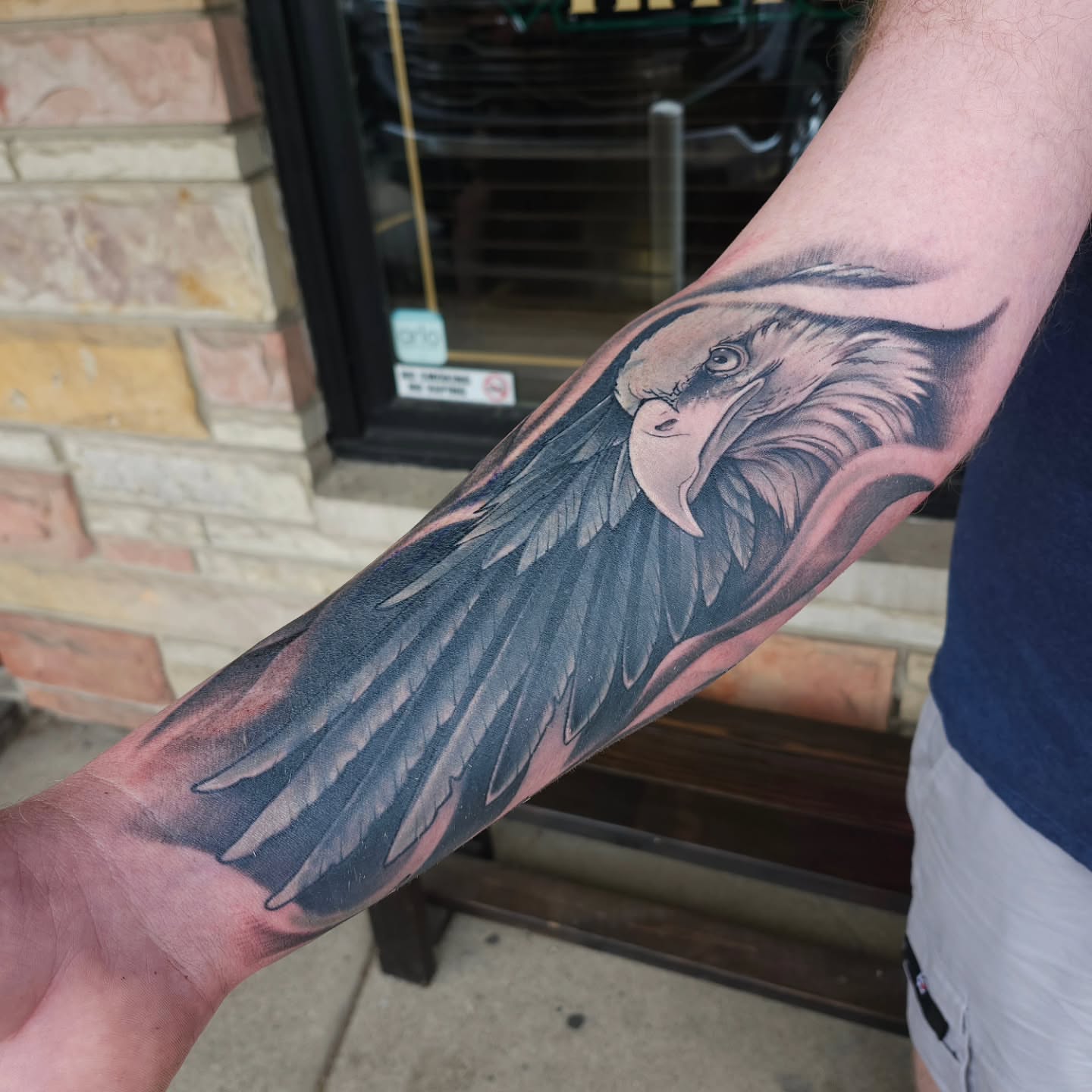 Eagle realism tattoo on the forearm by Chris Wodarski
