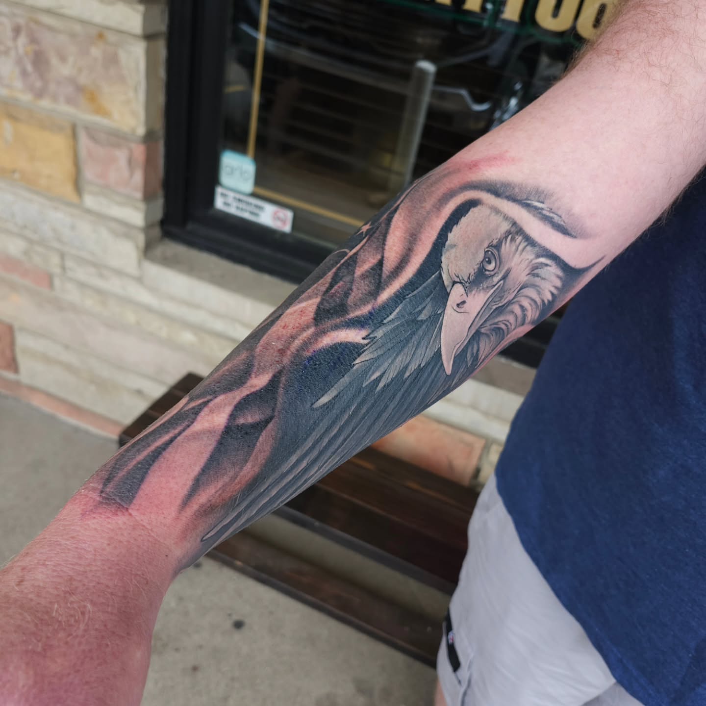 Eagle realism tattoo on the forearm by Chris Wodarski