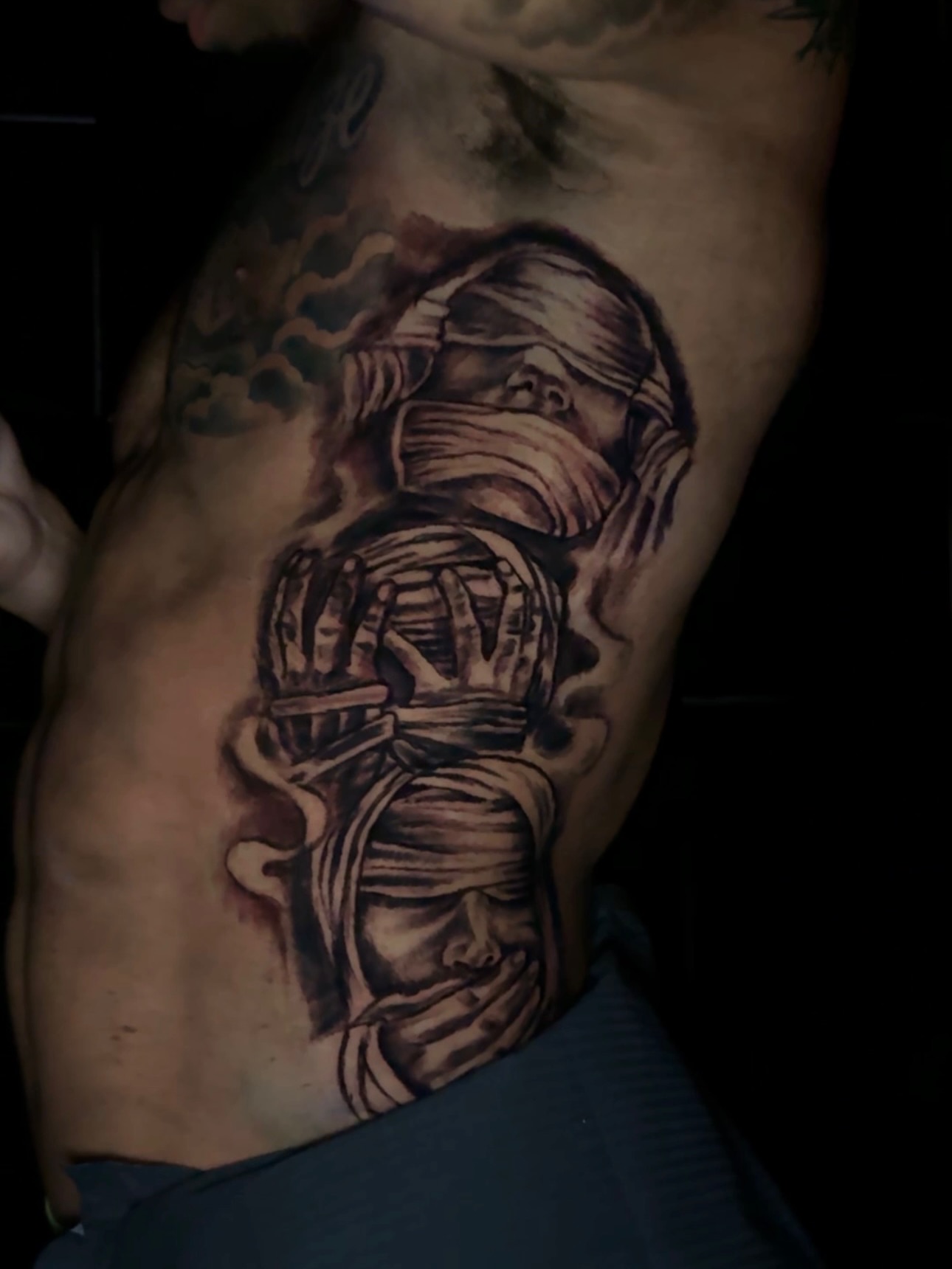 Mummy black and grey tattoo on the ribs by dallas tattoo artist, Duncanville, Texas