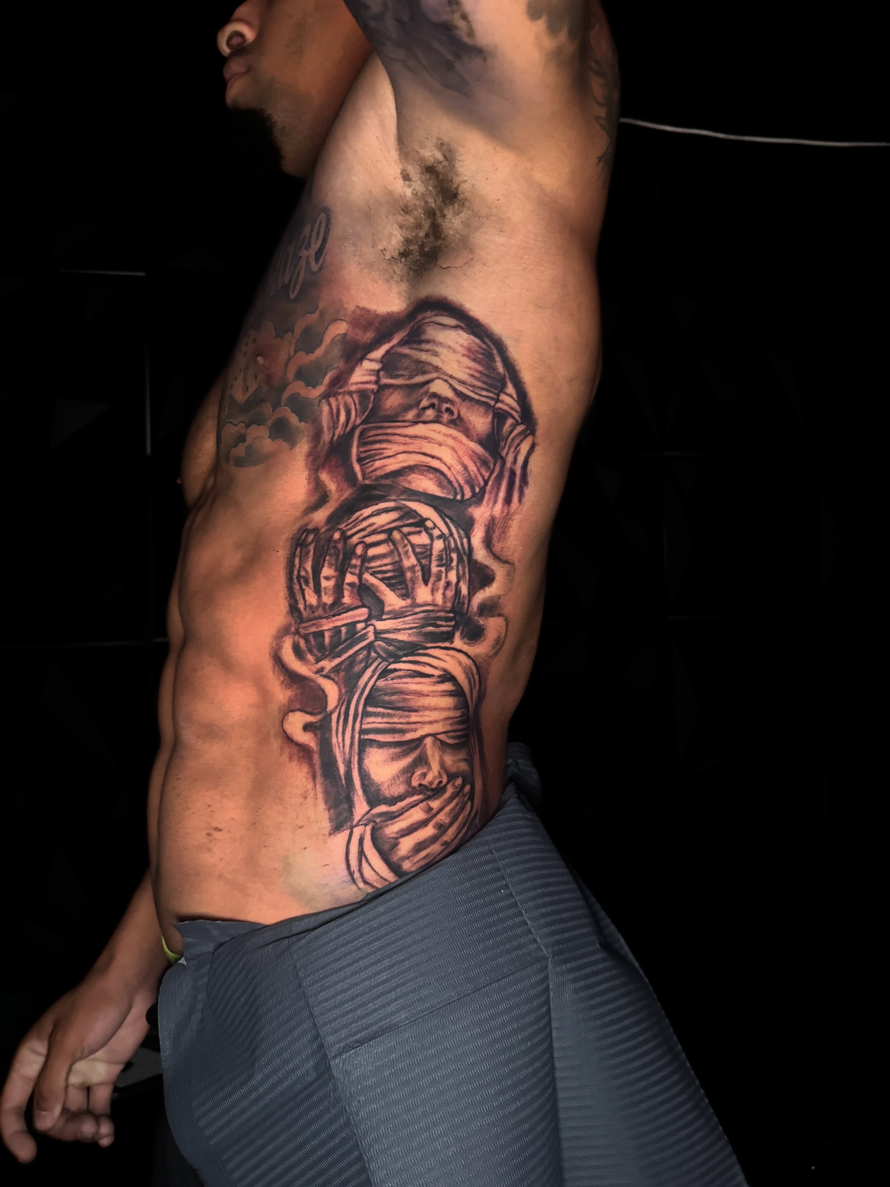 Mummy black and grey tattoo on the ribs by dallas tattoo artist, Duncanville, Texas