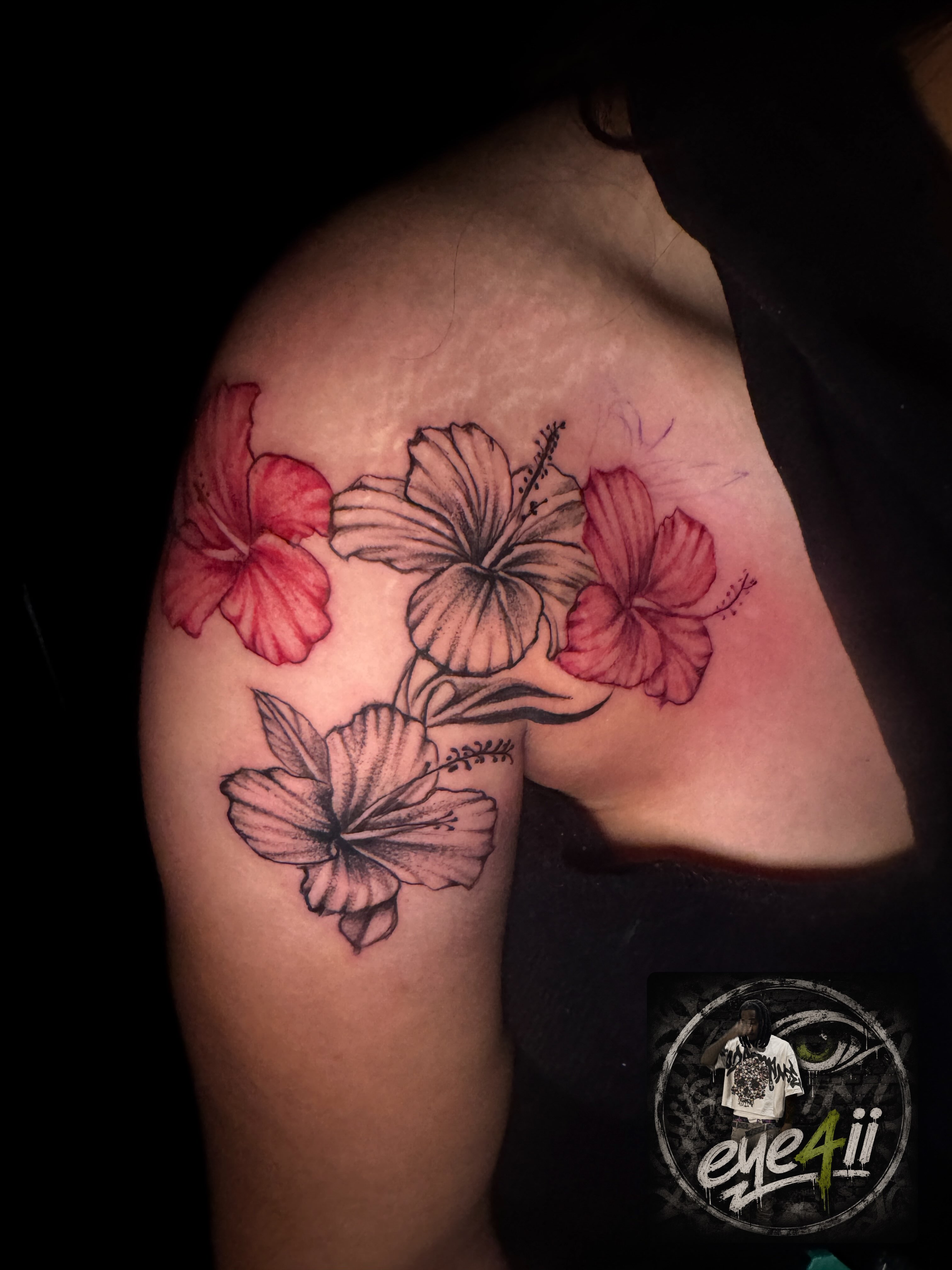 Hibiscus flowers realism tattoo on the shoulder by dallas tattoo artist, Duncanville, Texas