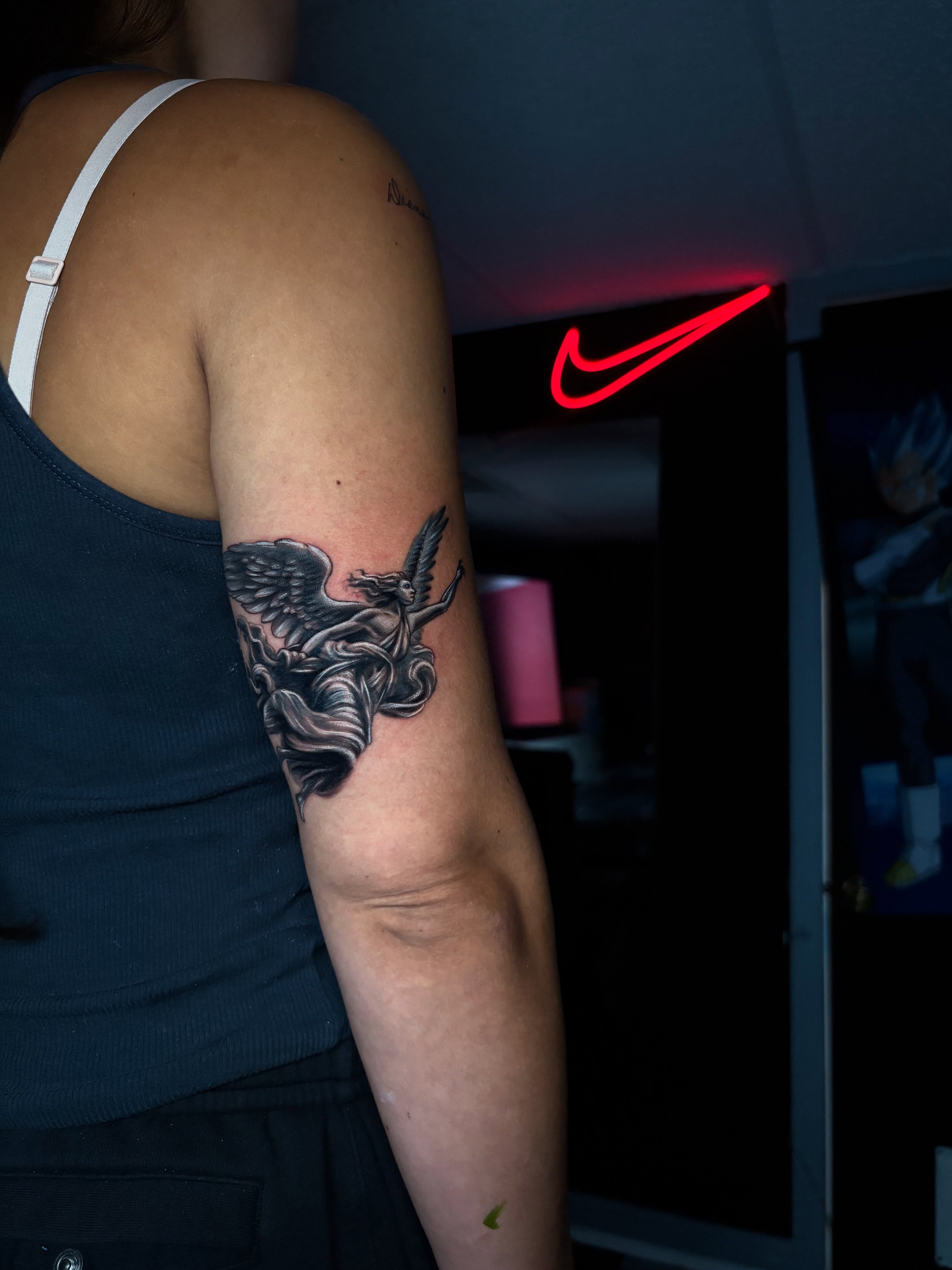 Winged creature realism tattoo on the forearm by Nikko