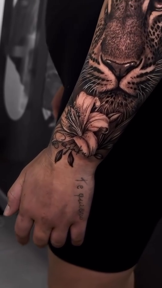Leopard face with flowers realism tattoo by Francis nieves, Miami, Florida