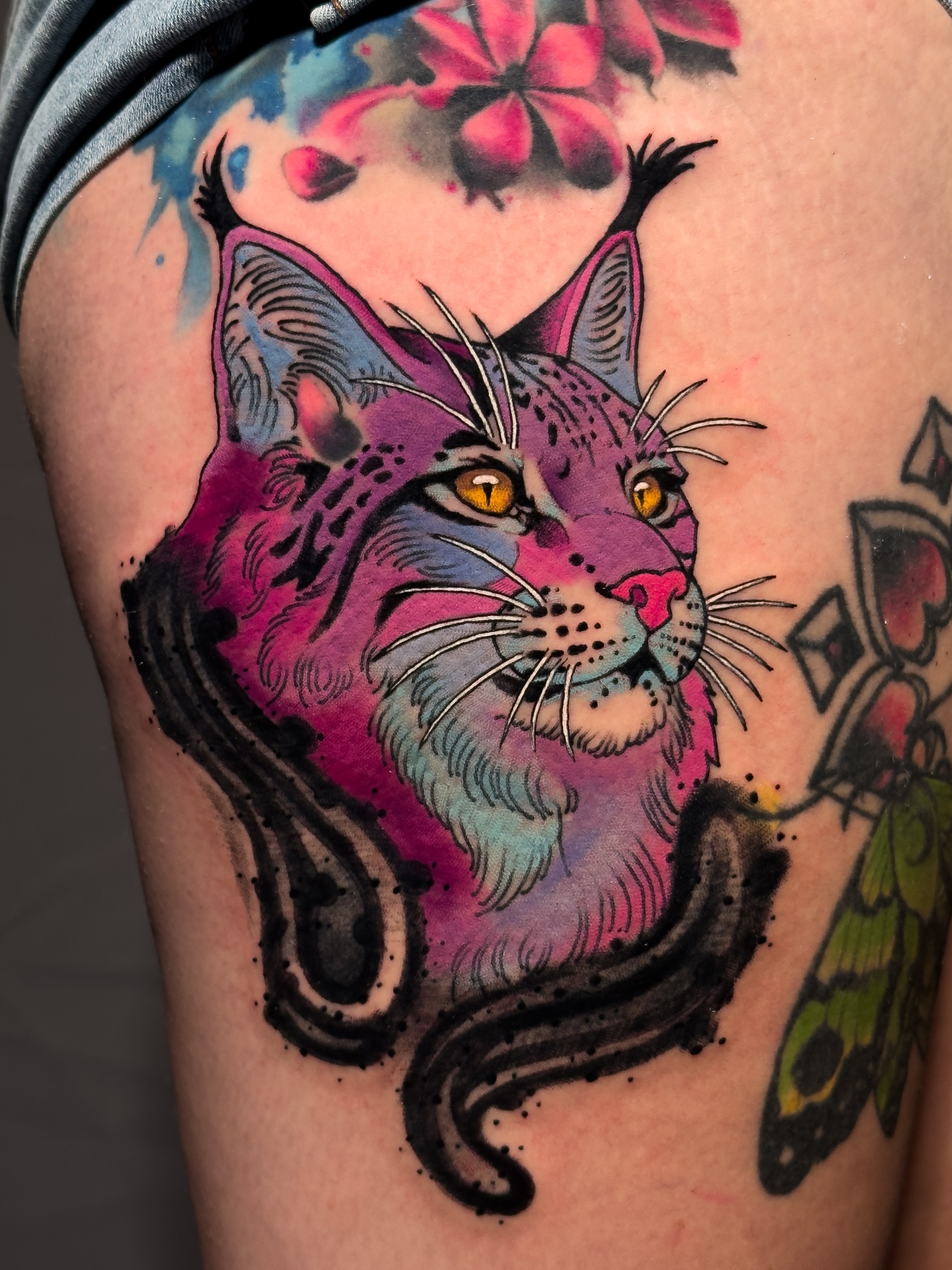 Cat American traditional tattoo on the thigh by Igor Puente