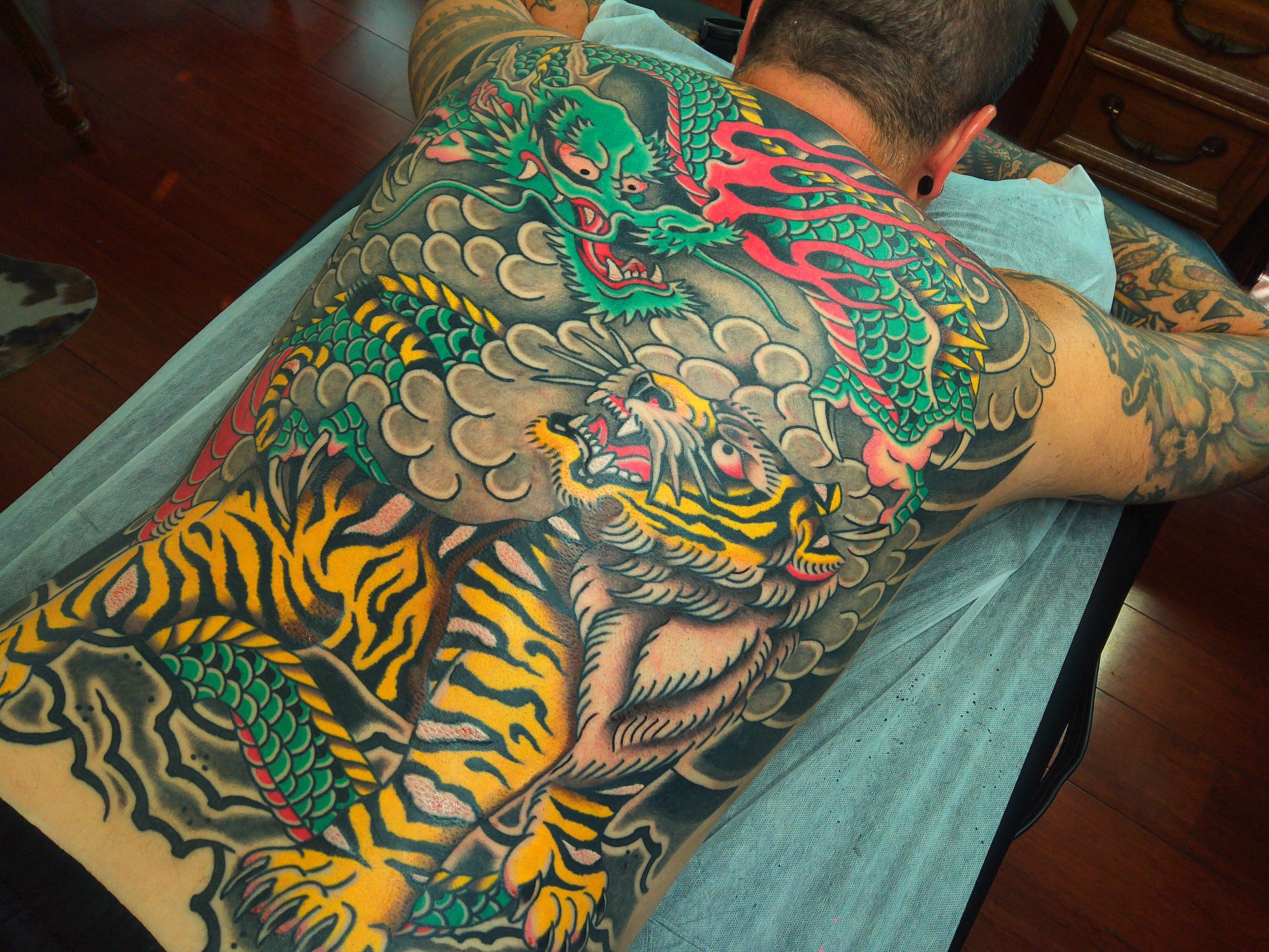 Dragon and tiger japanese irezumi tattoo on the back by ༺tessa༻