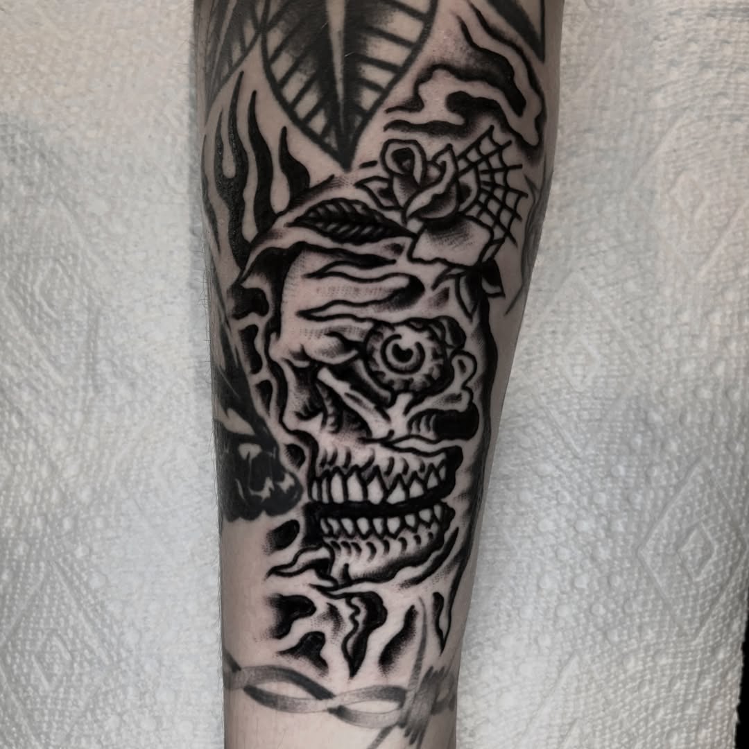 Skull with roses realism tattoo on the forearm by π³πππ πΆπππππ