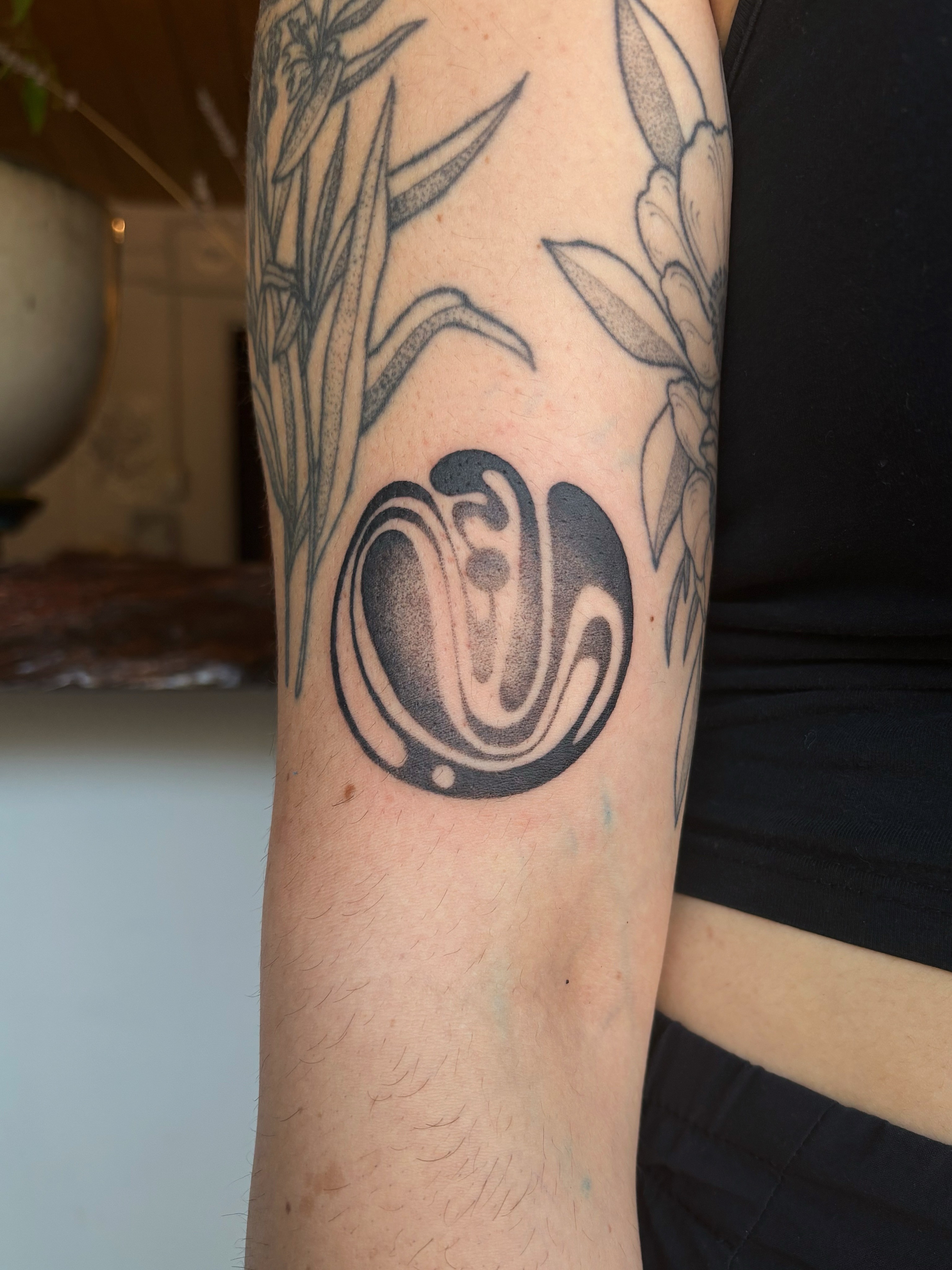 Abstract swirl black and grey tattoo on the forearm by Abigail, San Francisco, California