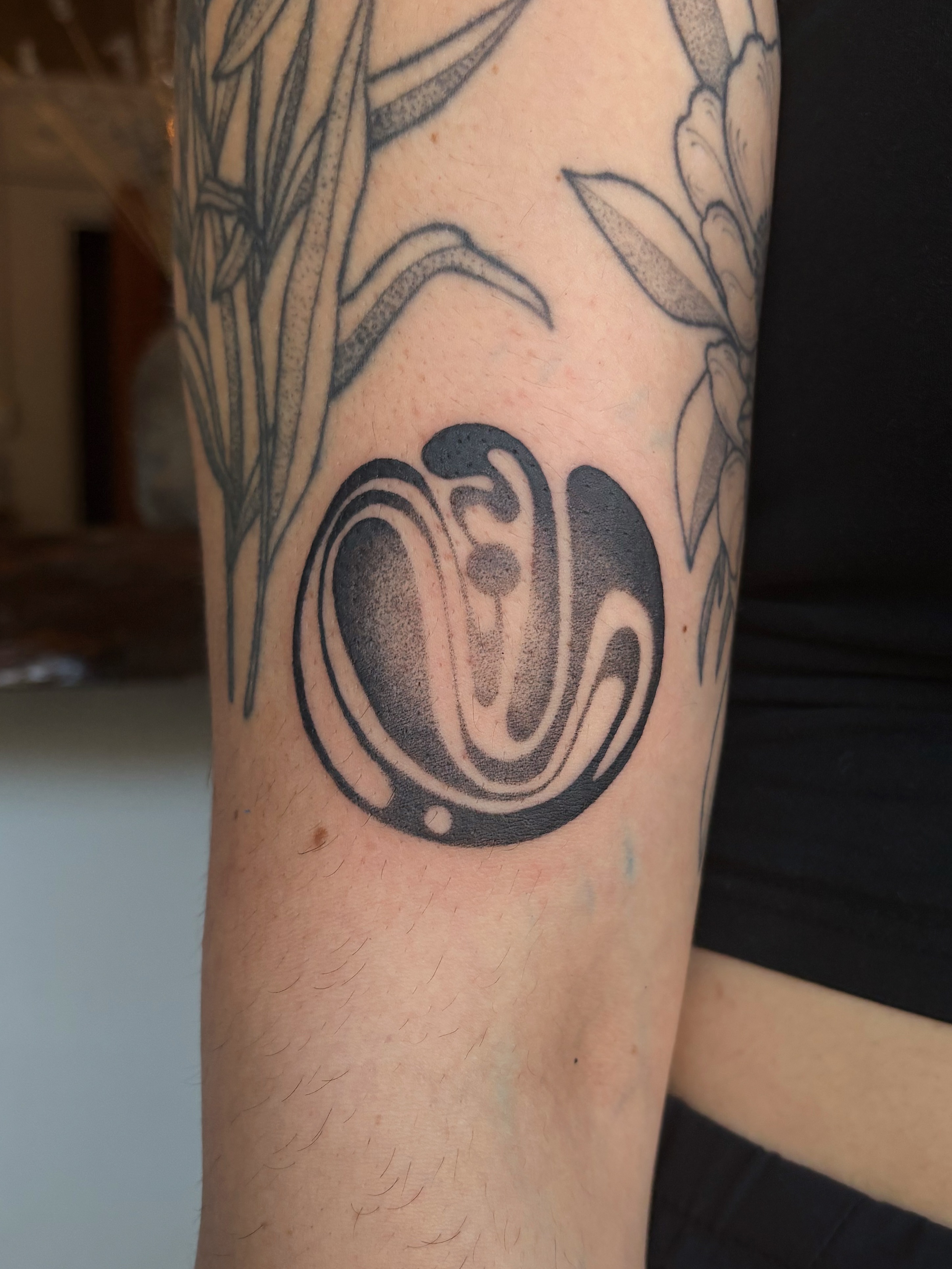Abstract swirl black and grey tattoo on the forearm by Abigail, San Francisco, California