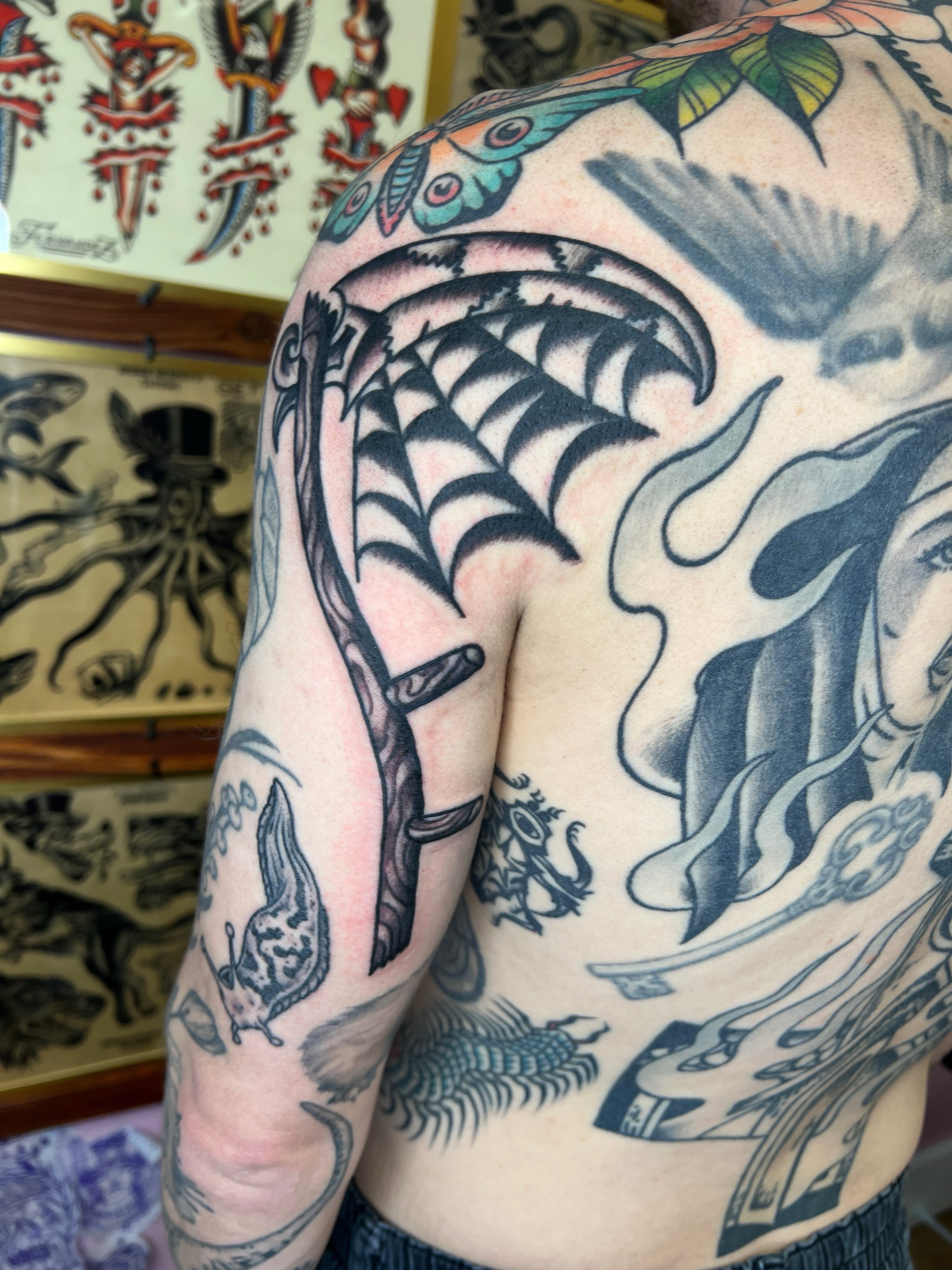 Spiderweb and dagger American traditional tattoo on the shoulder by Leo 🌞 Pdx Tattoo