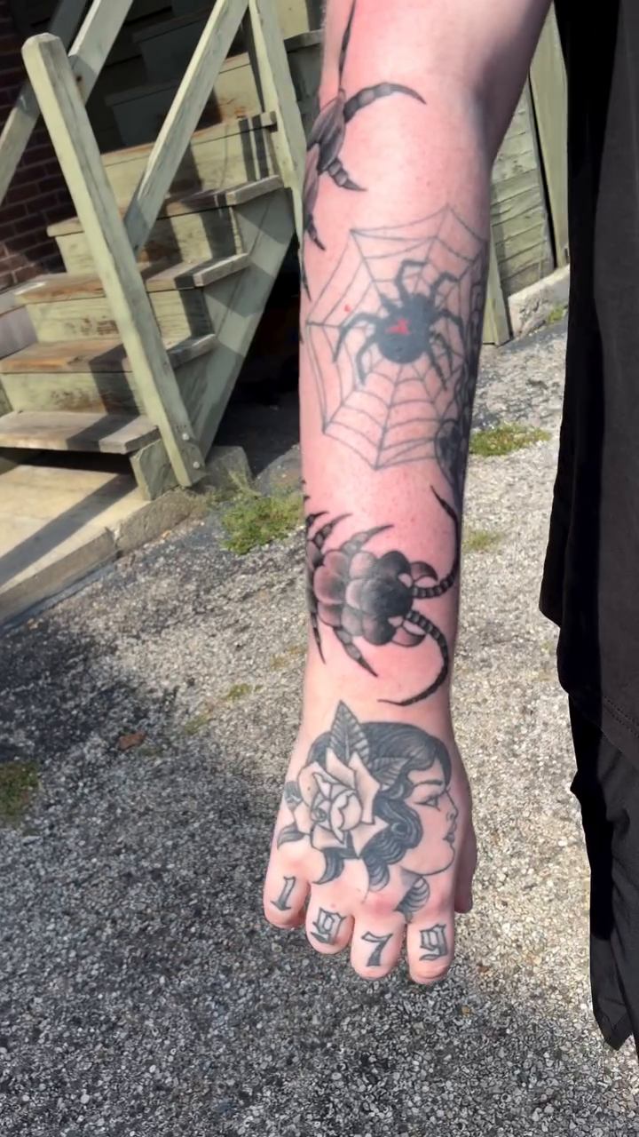 Spider and flowers realism tattoo by jim collins, Dayton, Ohio