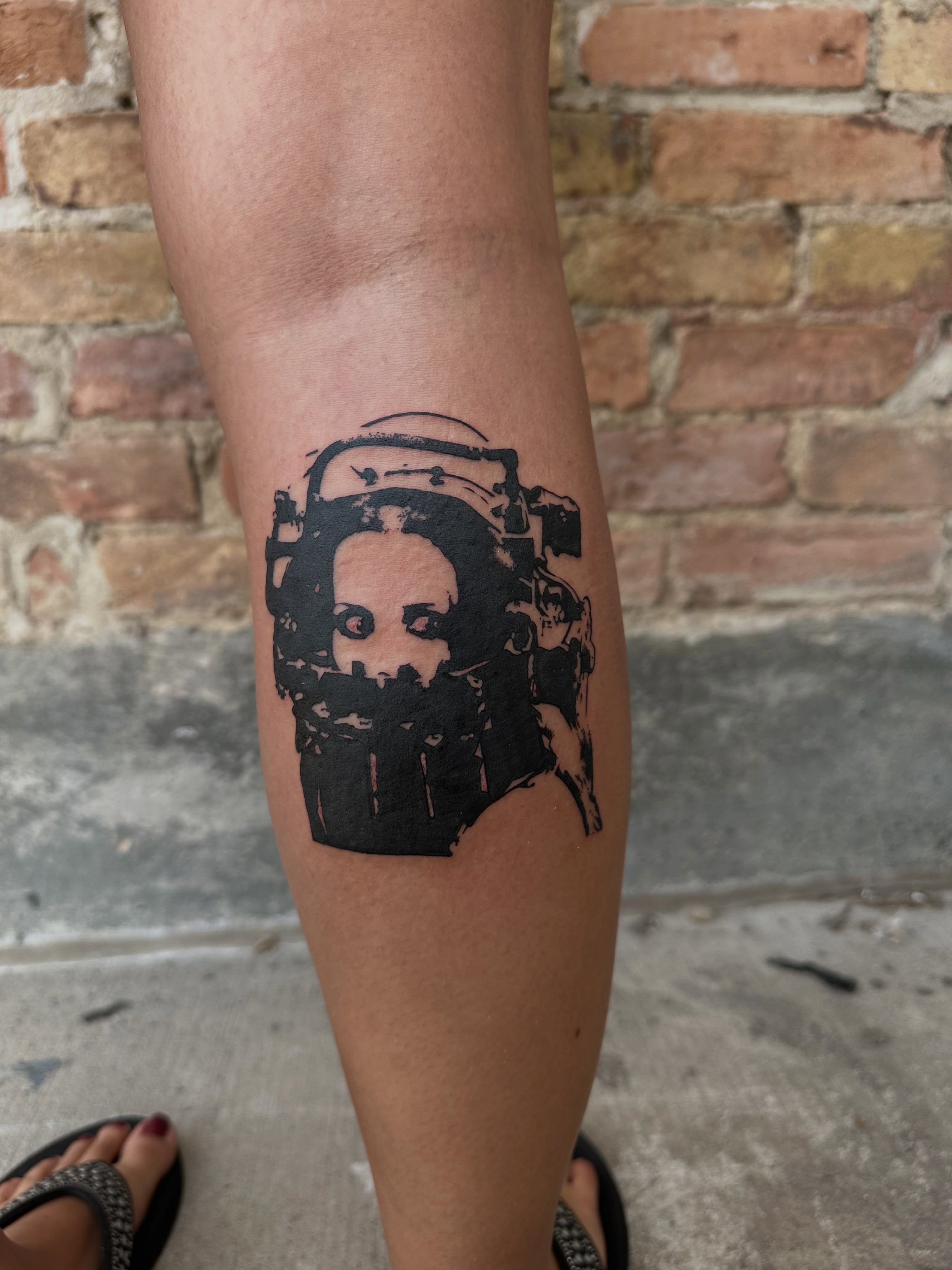 Astronaut helmet black and grey tattoo on the forearm by 𝓡𝓸𝓼𝓮 𝓗𝓪𝔂𝓮𝓼