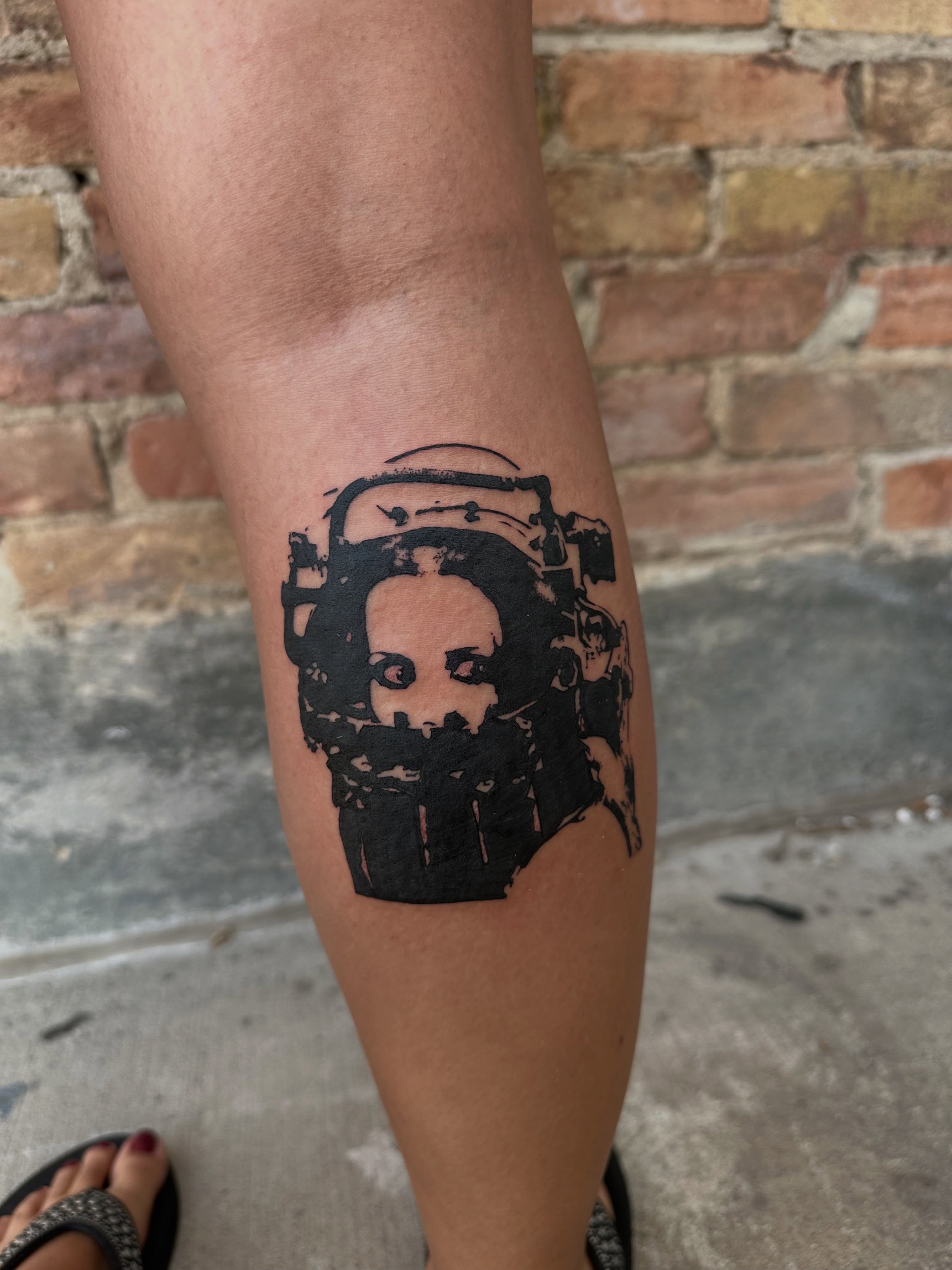 Camera black and grey tattoo on the forearm by 𝓡𝓸𝓼𝓮 𝓗𝓪𝔂𝓮𝓼