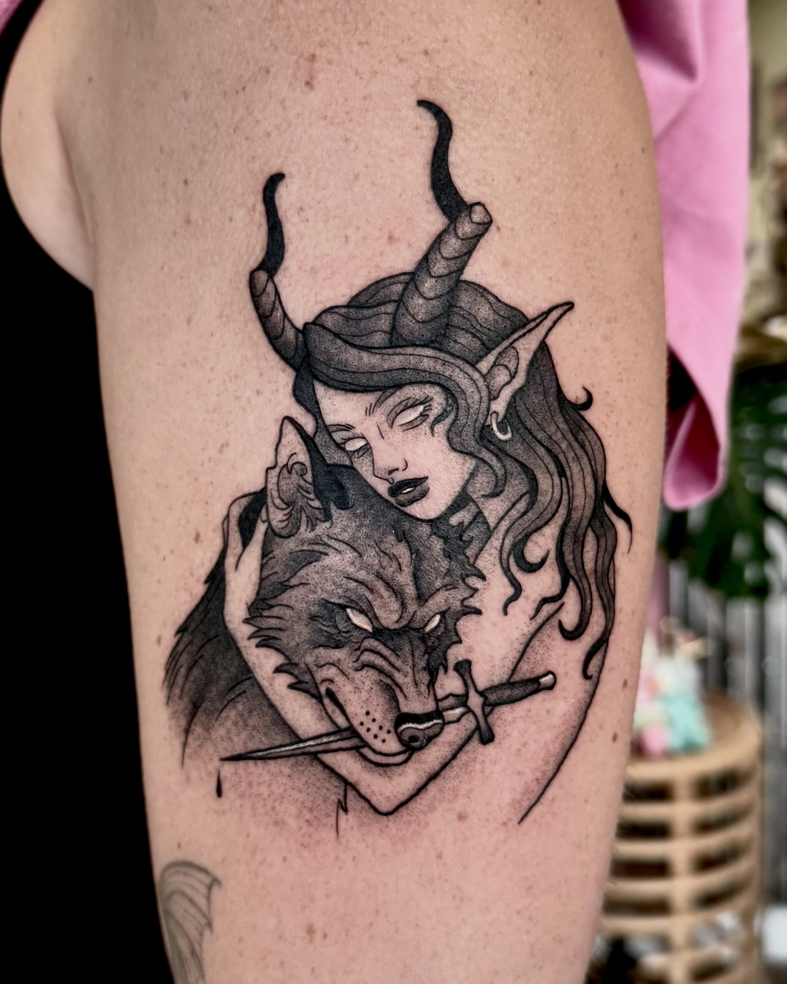 Woman with wolf realism tattoo on the forearm by Eden Allen