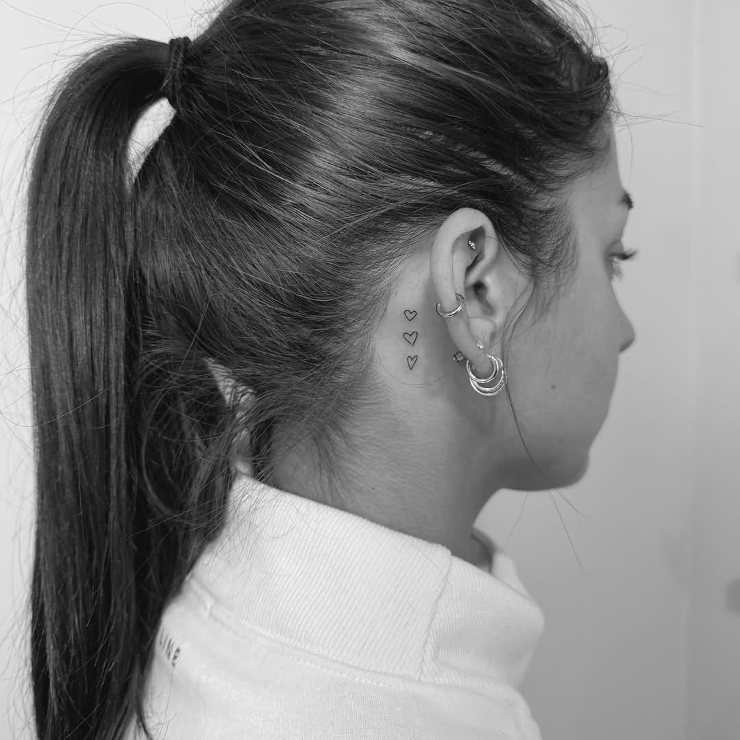 Hearts black and grey tattoo on the head by Jessica, Cheektowaga, New York