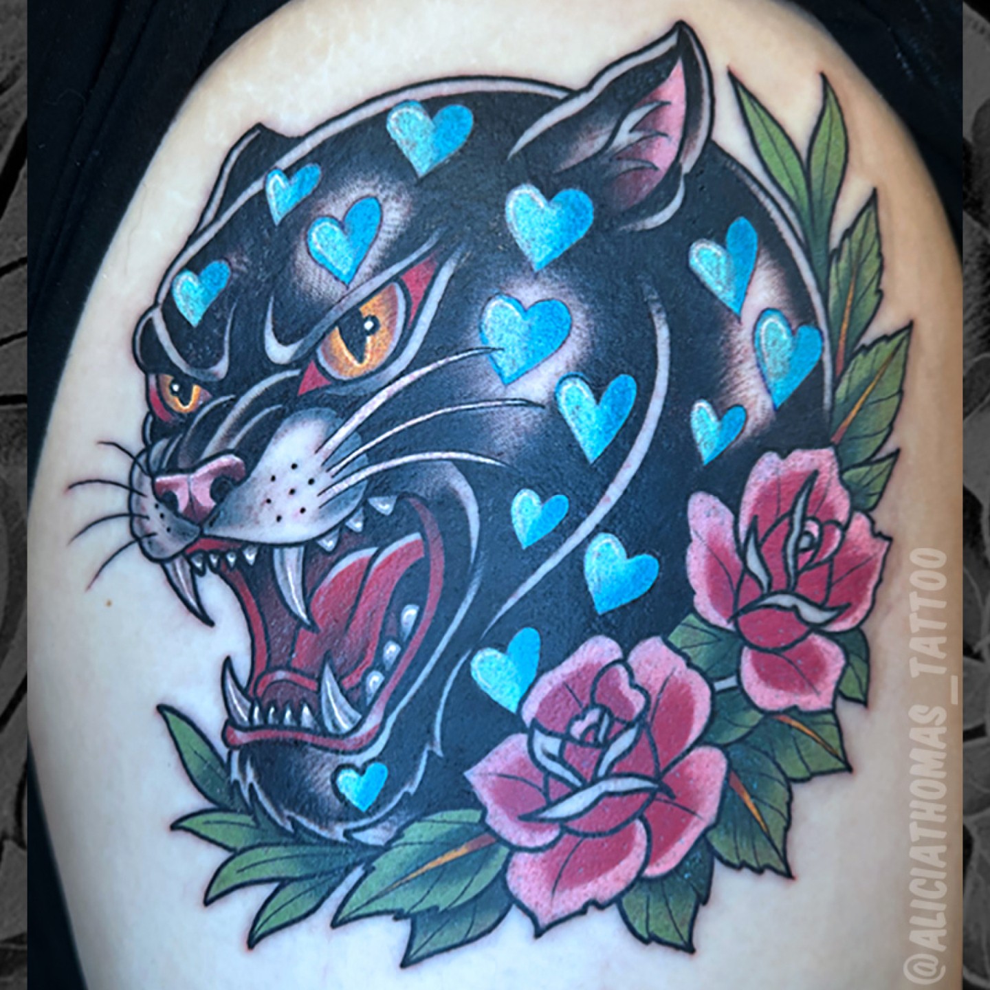 Panther with hearts American traditional tattoo on the shoulder by 𝖆𝖑𝖎𝖈𝖎𝖆 𝖙𝖍𝖔𝖒𝖆𝖘