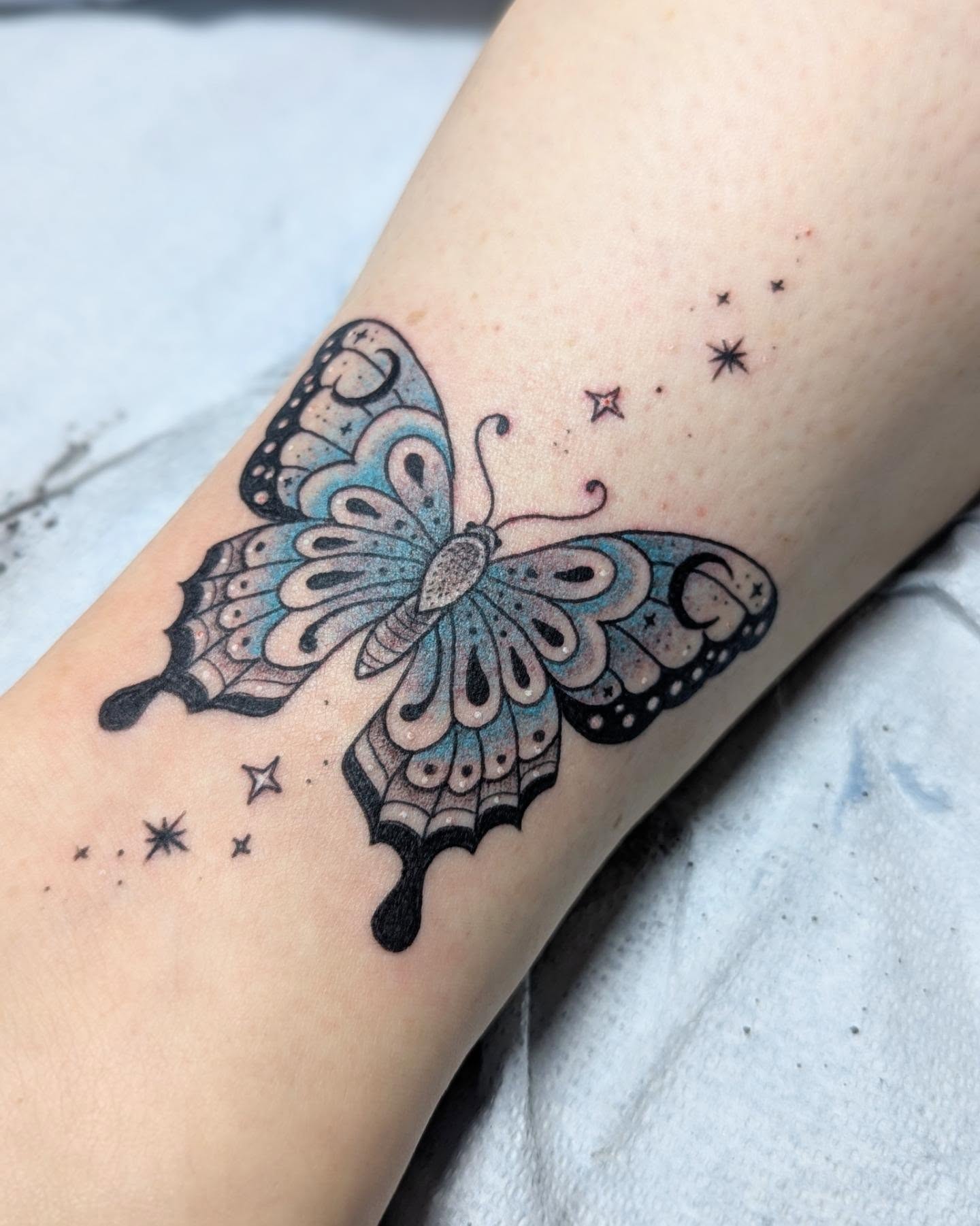 Butterfly dotwork tattoo on the forearm by Dani Harkey