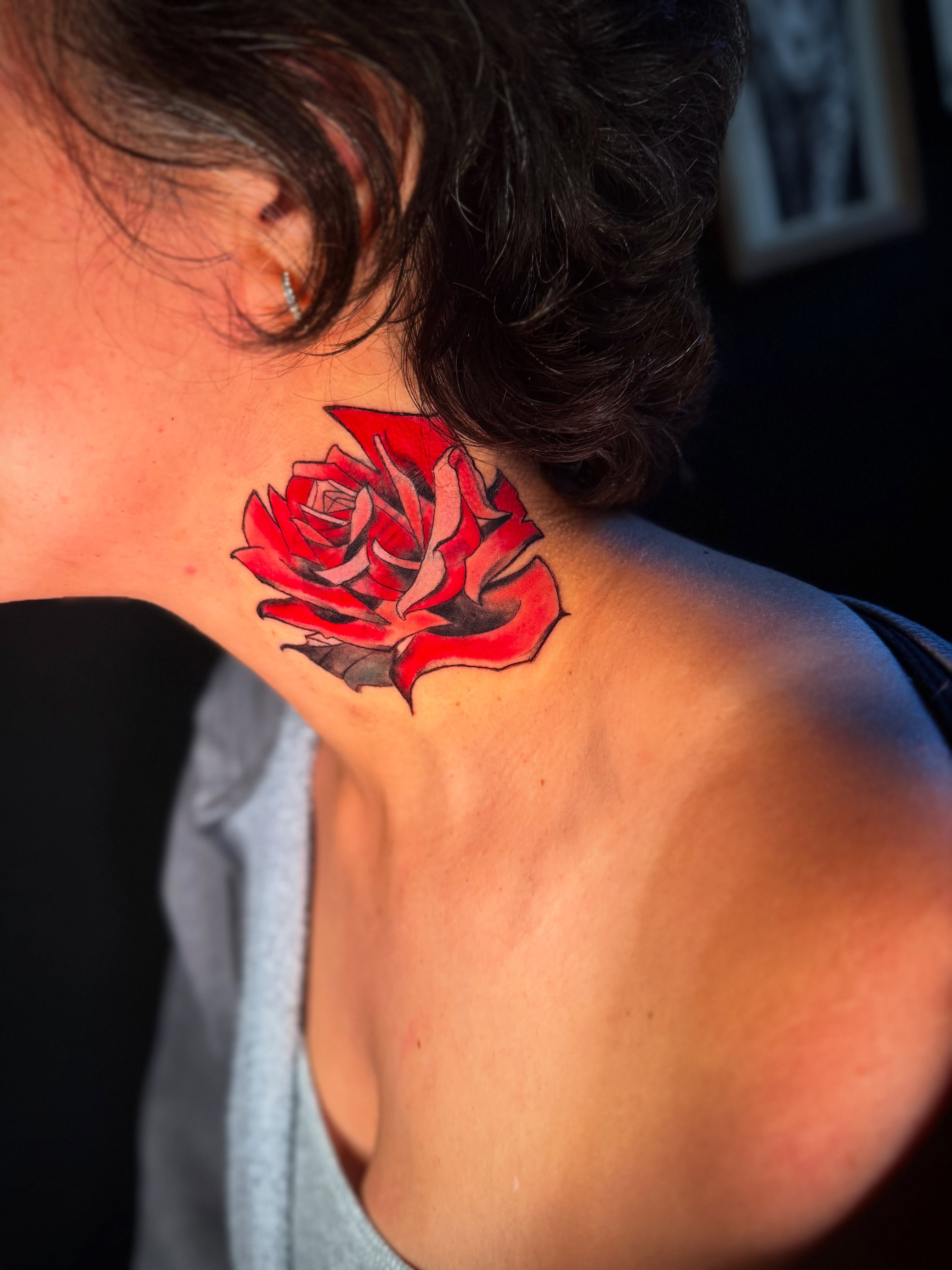 Red rose realism tattoo on the shoulder by Monica Gonzalez