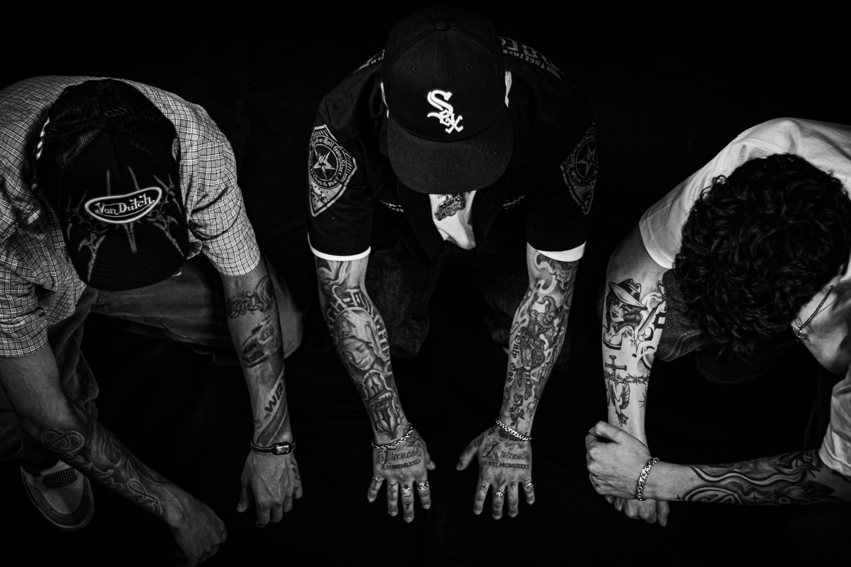 Tattooed arms black and grey tattoo on the upper arm by Kevin