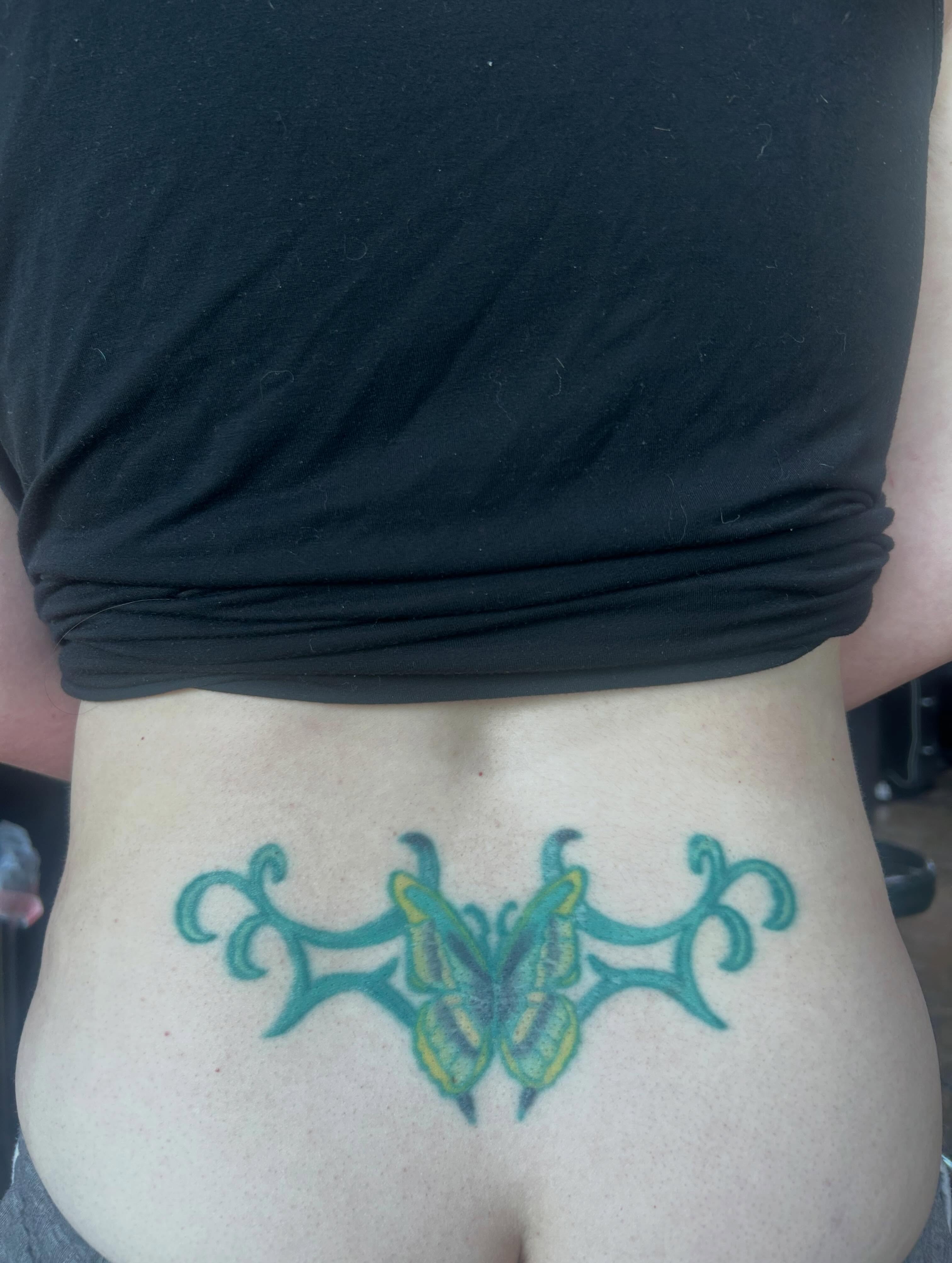 Butterfly geometric tattoo on the torso by Salt Lake City tattoo artist
