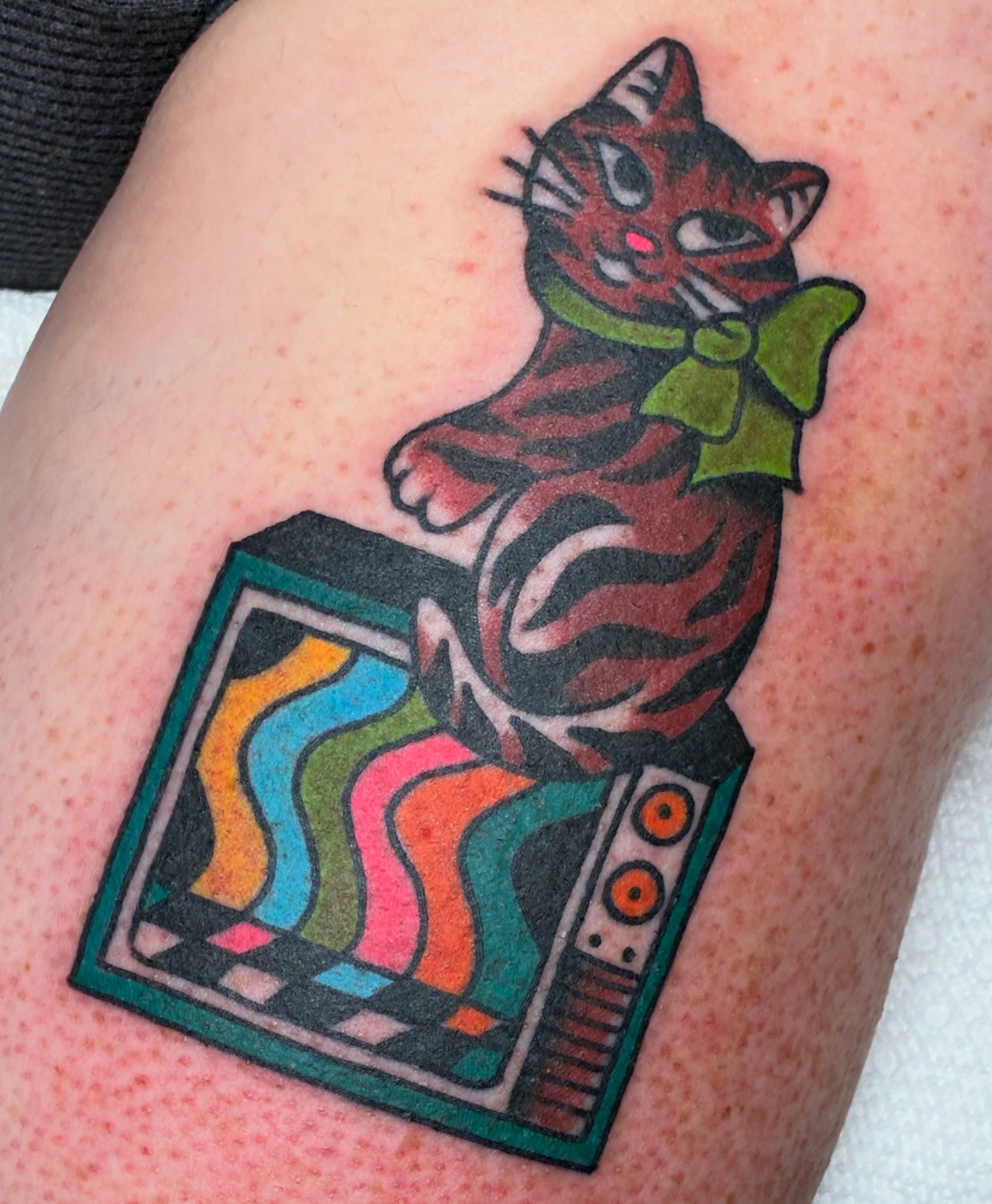 Cat American traditional tattoo on the thigh by Sav Robinson