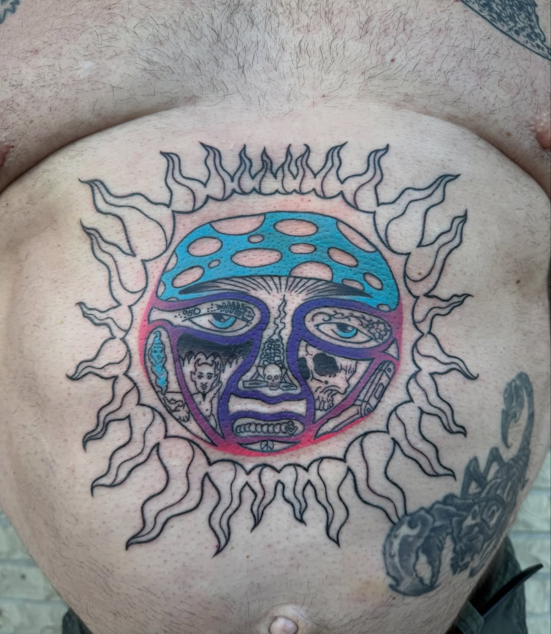 Mushroom head Chicano tattoo on the chest by Abby Hofman
