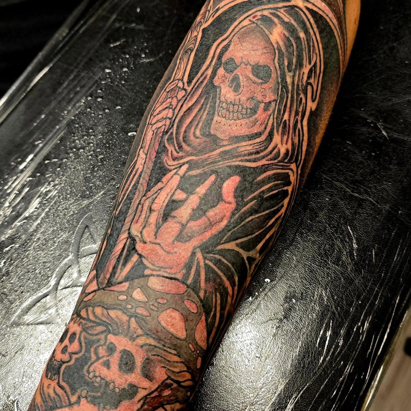 Grim reaper neo-traditional tattoo on the forearm by Captain Michael Devious