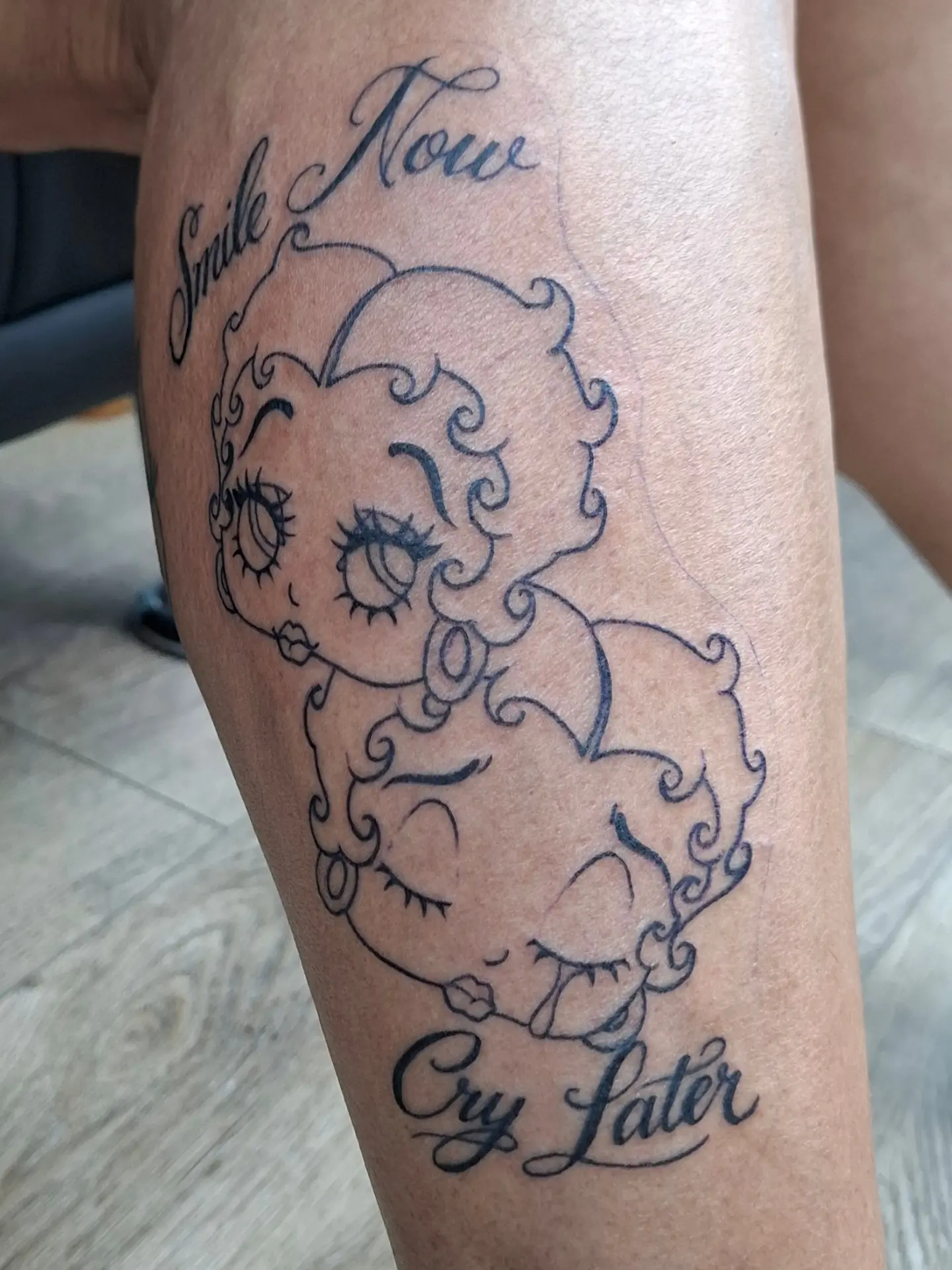 Betty Boop American traditional tattoo on the thigh by ꧁༺𝔅𝔦𝔤 ℭ𝔥𝔲𝔫𝔤𝔲𝔷༻꧂, San Diego, California