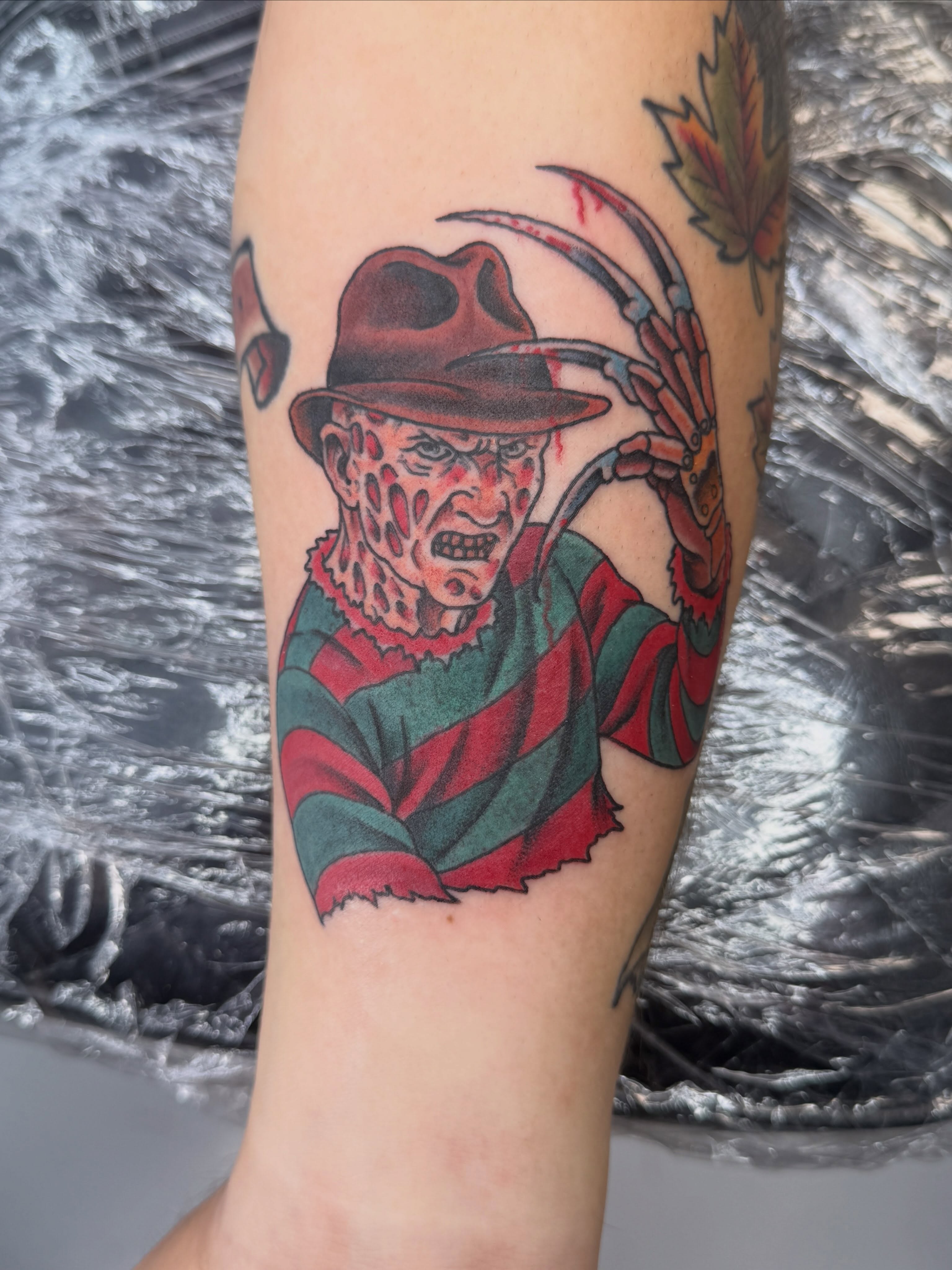 Freddy Krueger American traditional tattoo on the forearm by Trent Parsley