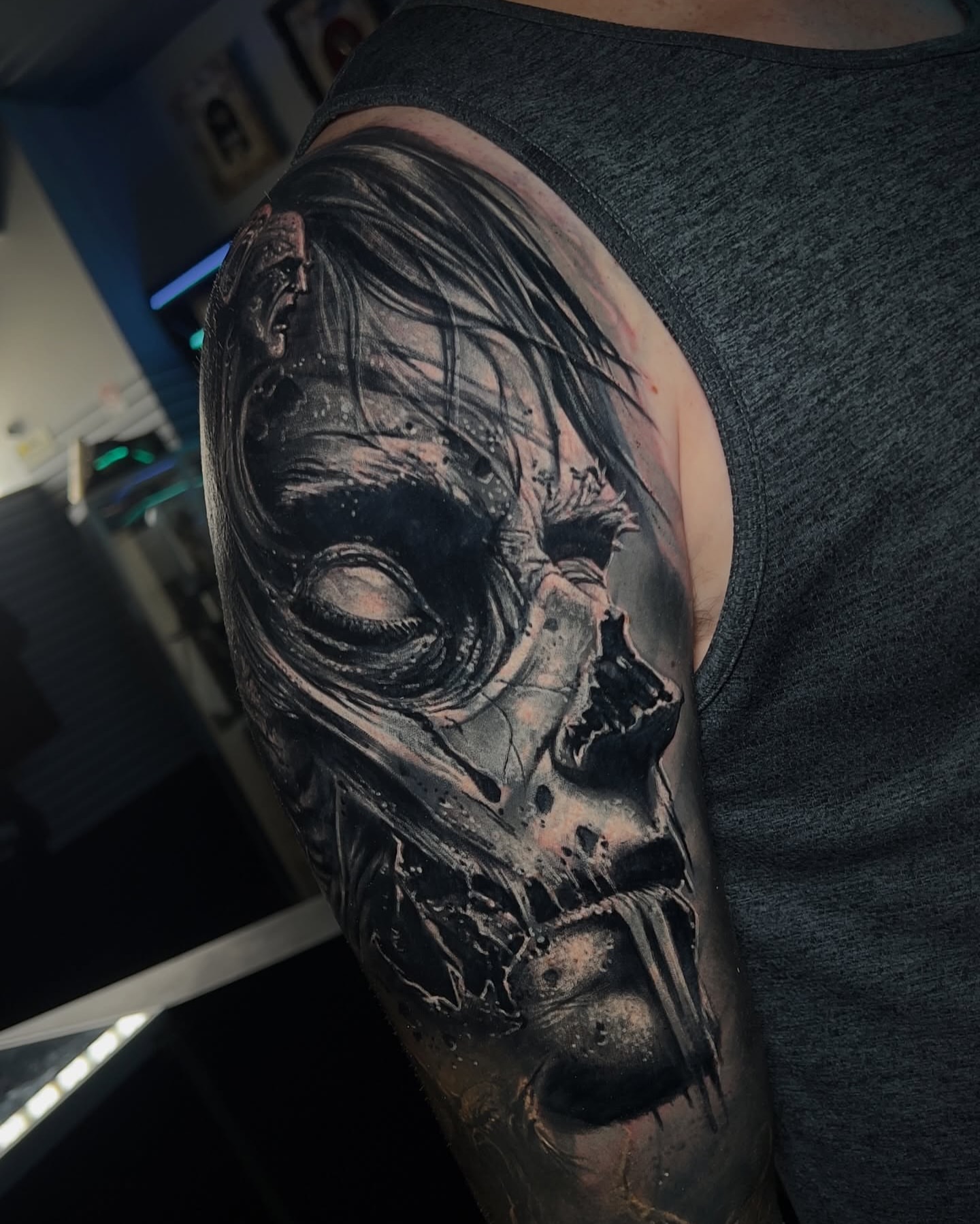 Skull dark realism tattoo on the shoulder by James Mullin