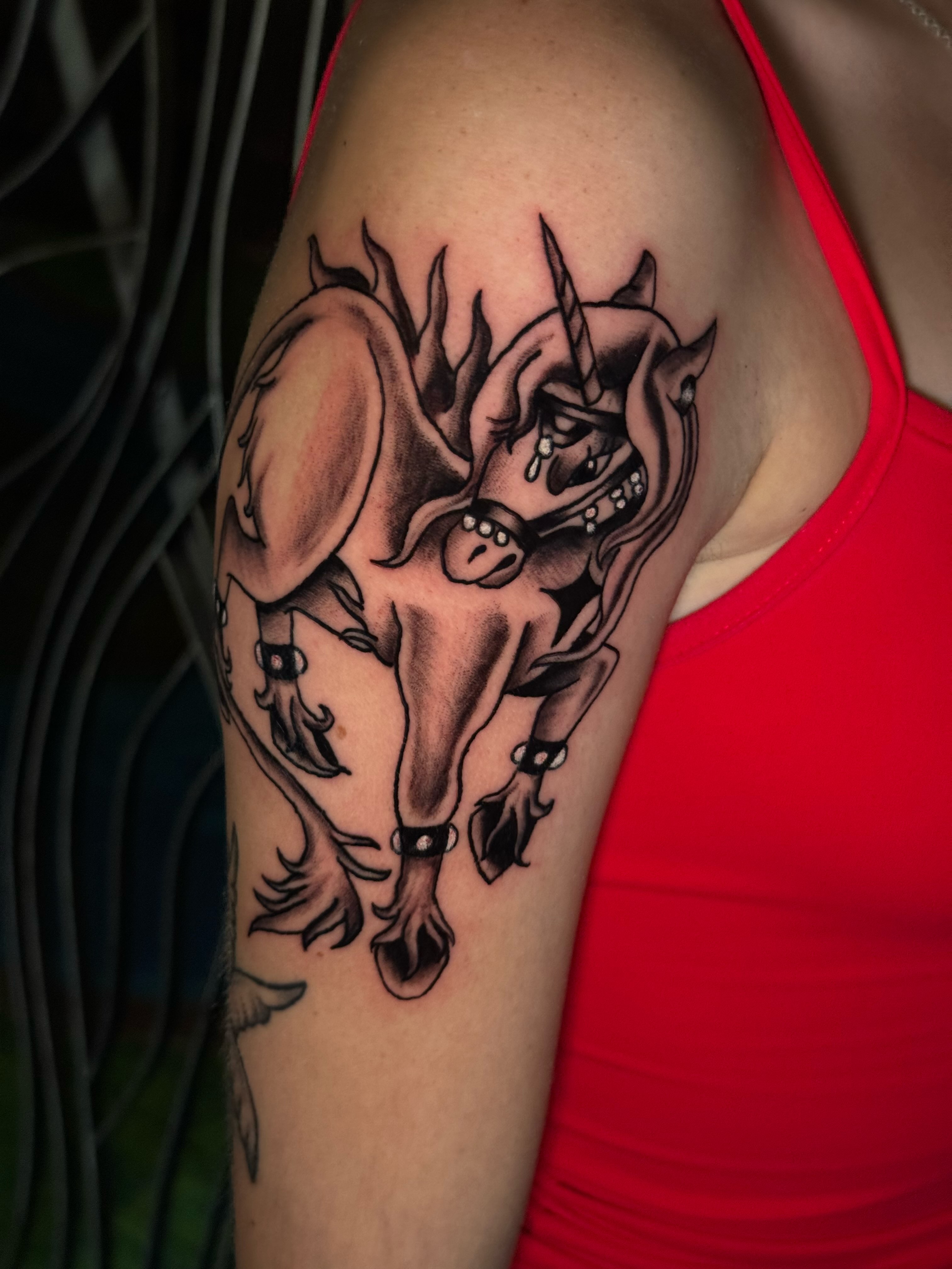 Unicorn black and grey tattoo on the shoulder by 🐆Cam Feral Tattoos