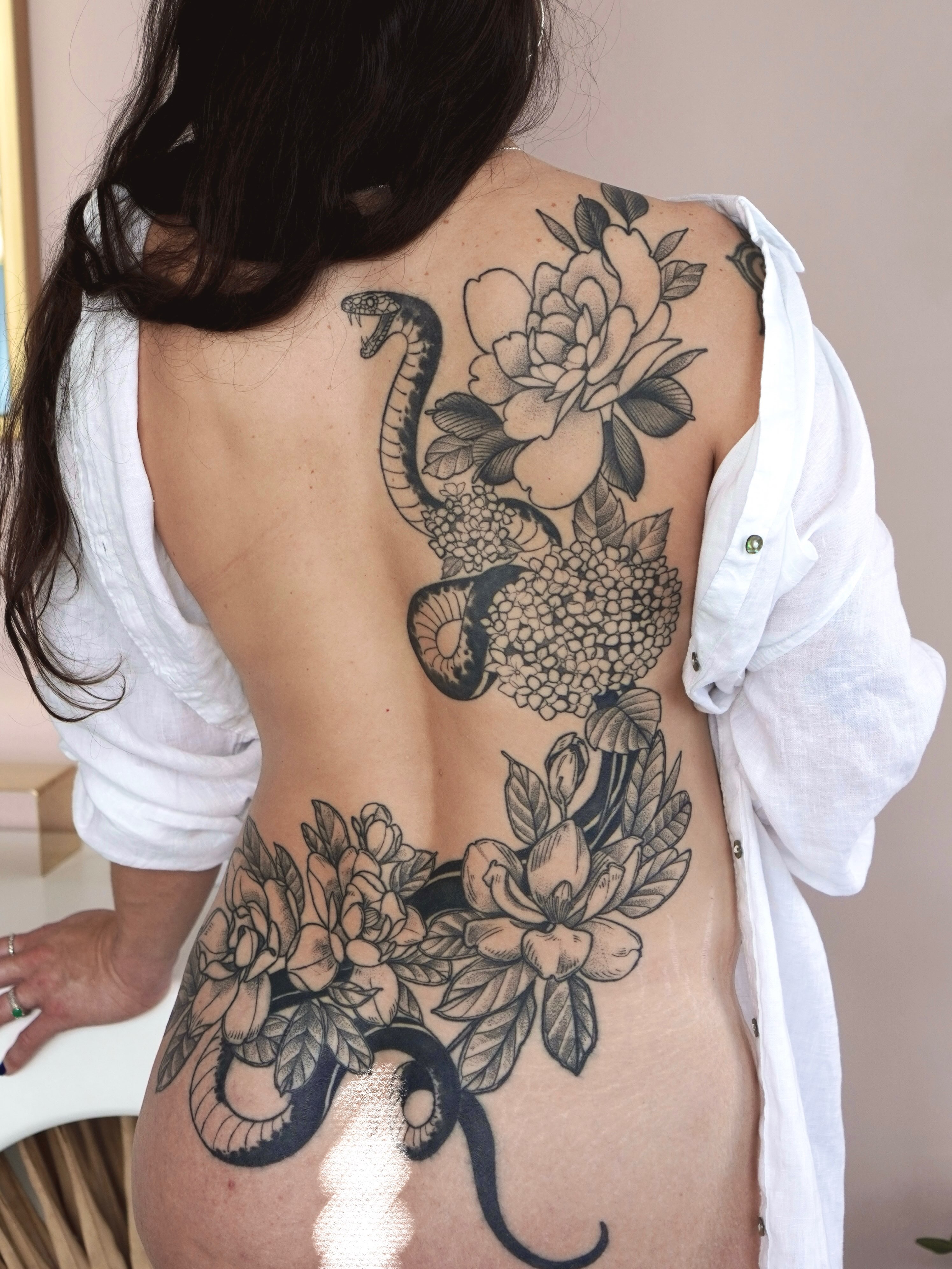 Snake and peony black and grey tattoo on the back by Marianna D D King