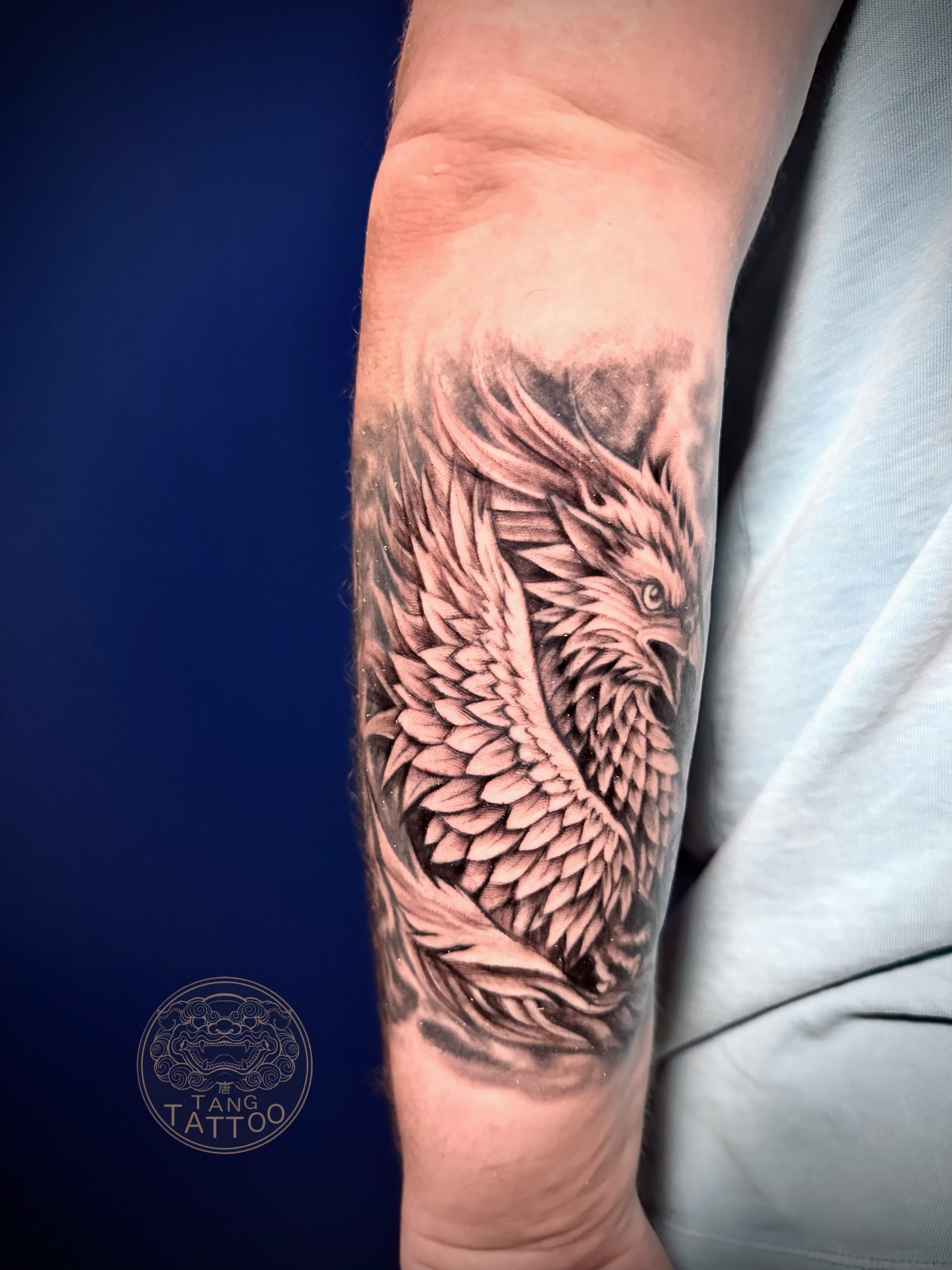 Phoenix realism tattoo on the forearm by Tang tattoo, Houston, Texas