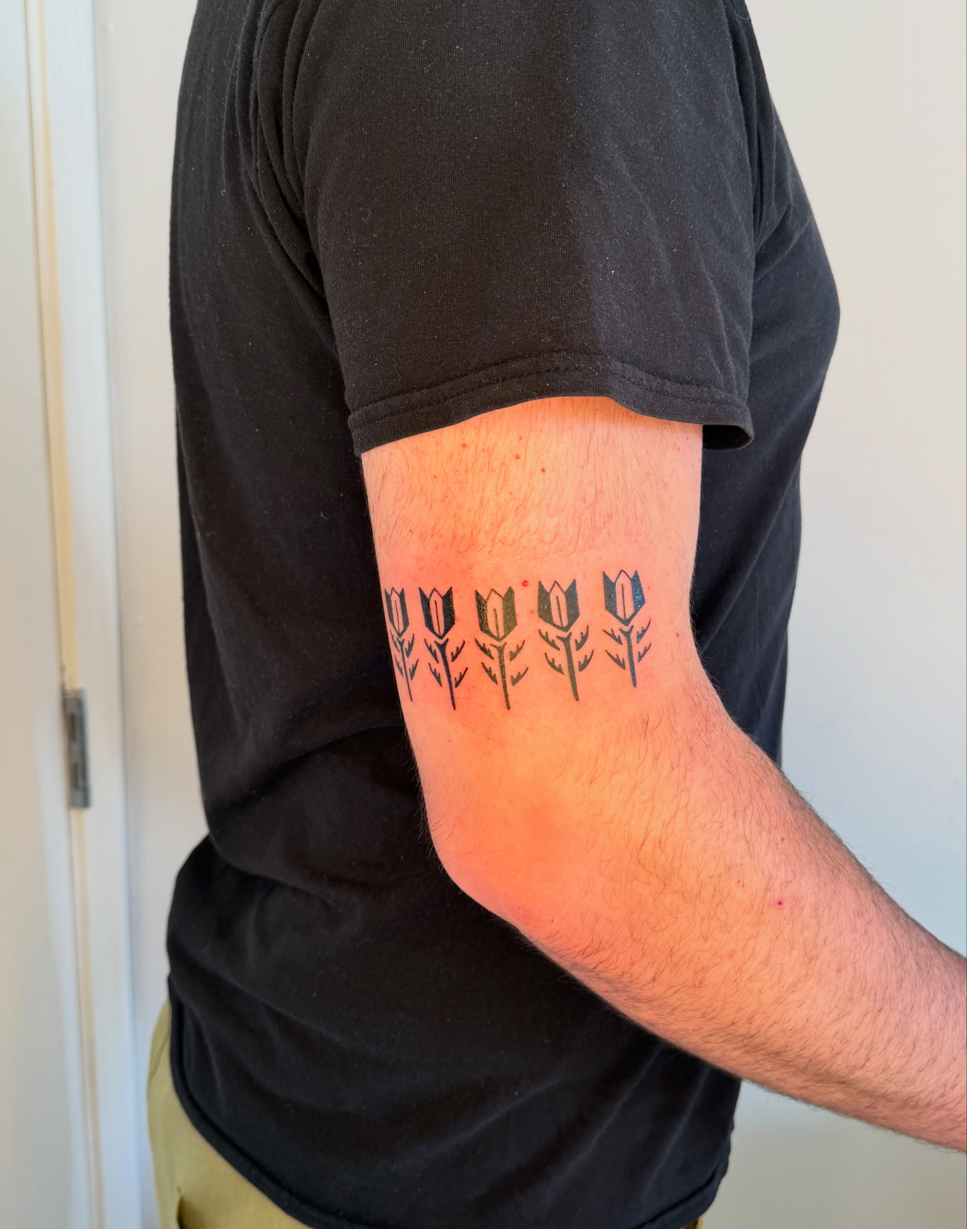 Tulips black and grey tattoo on the forearm by ♤ Catherine Stengel ♤