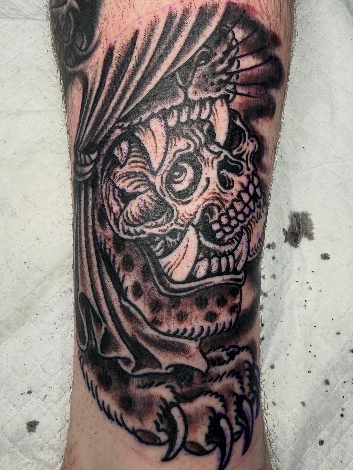 Skull dark realism tattoo on the forearm by Mike Wilson