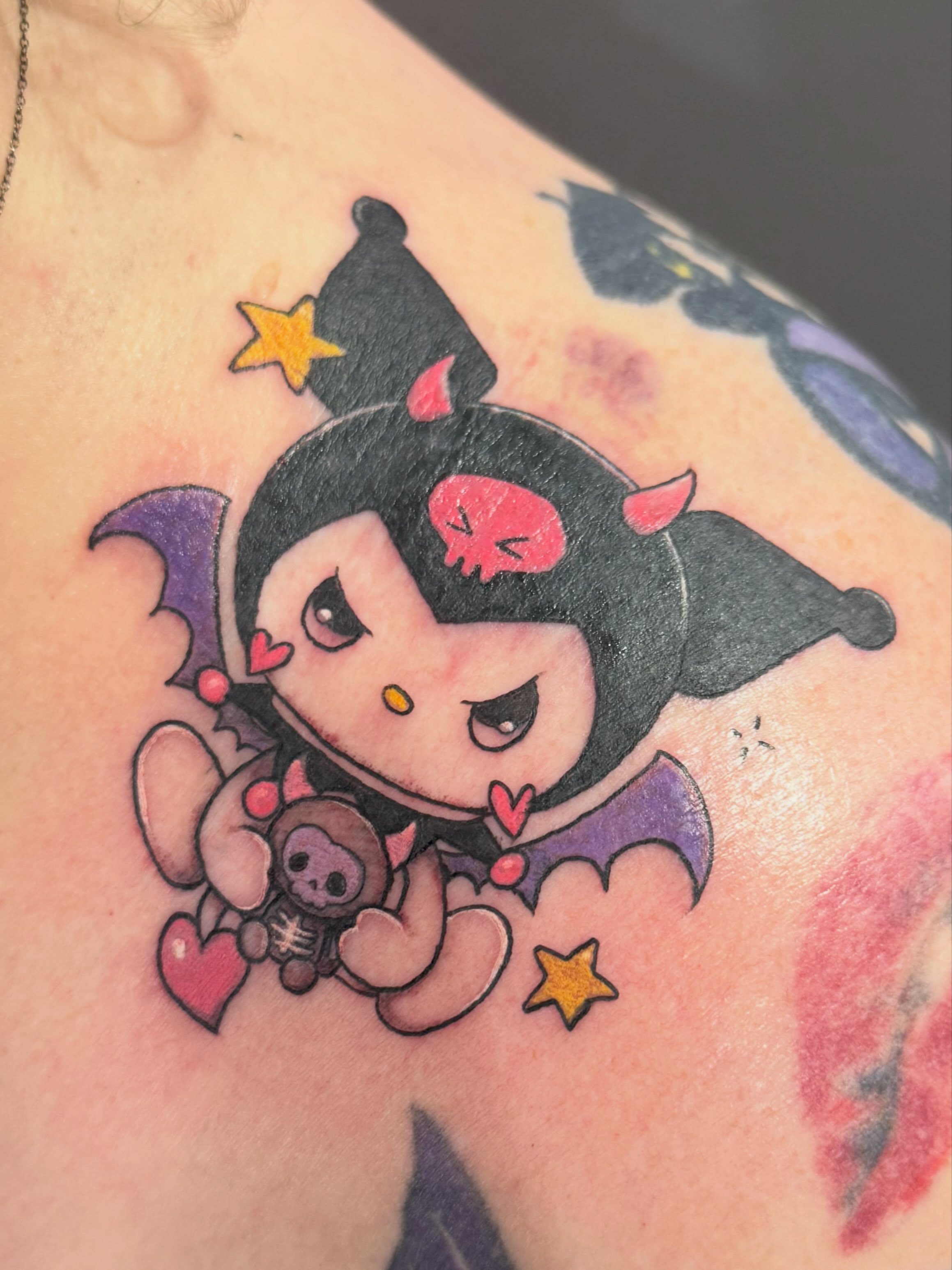 Bat character dotwork tattoo on the shoulder by Courtney