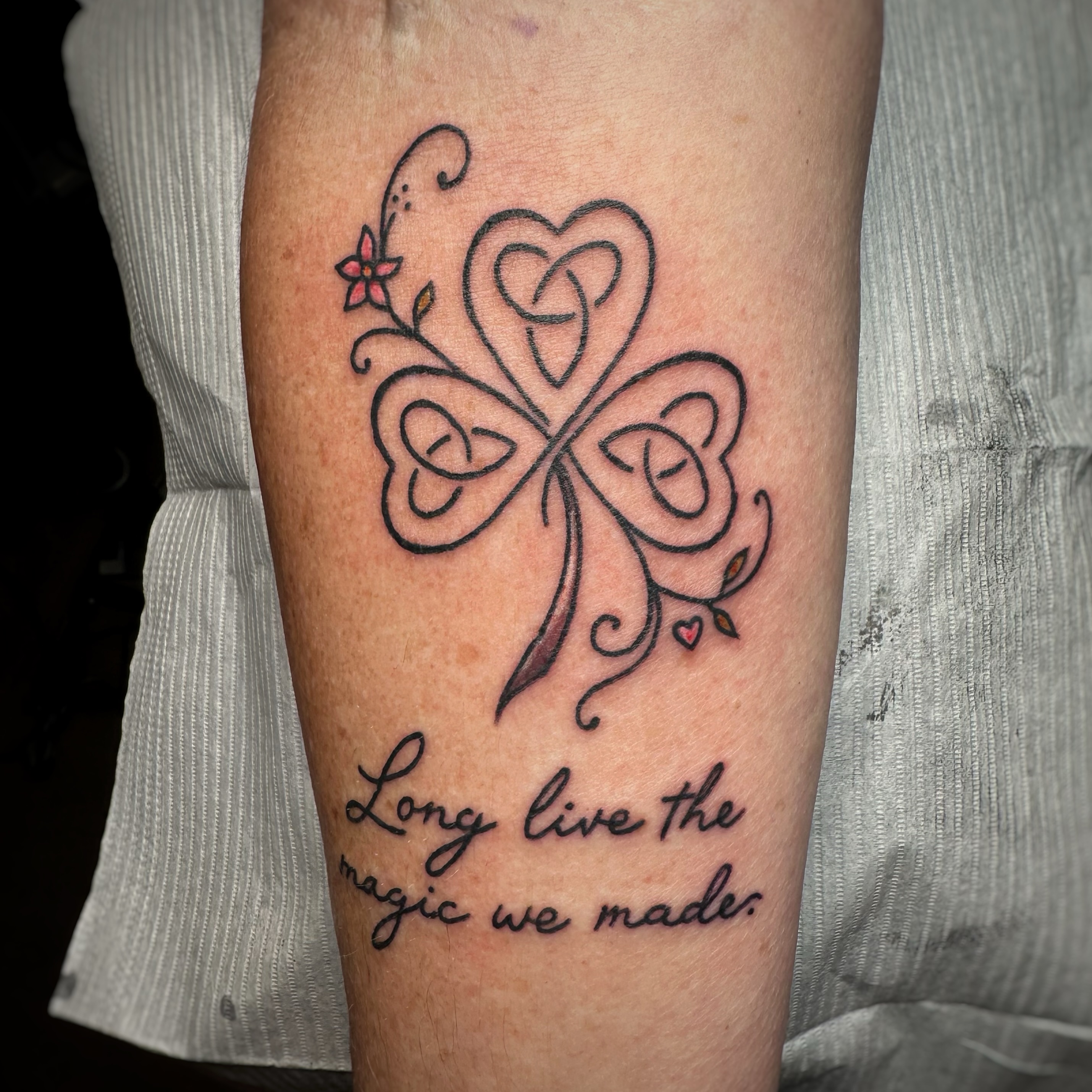 Clover and hearts fine line tattoo on the forearm by Anthony Guido