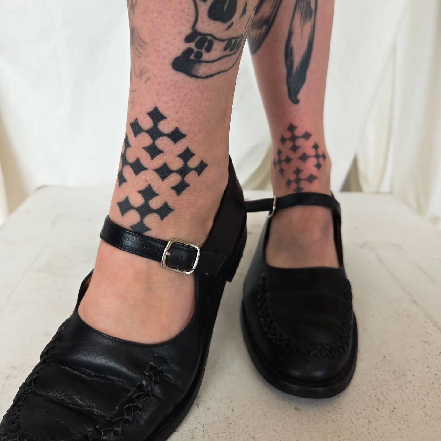 Crosses geometric tattoo on the calf by jules tattoos
