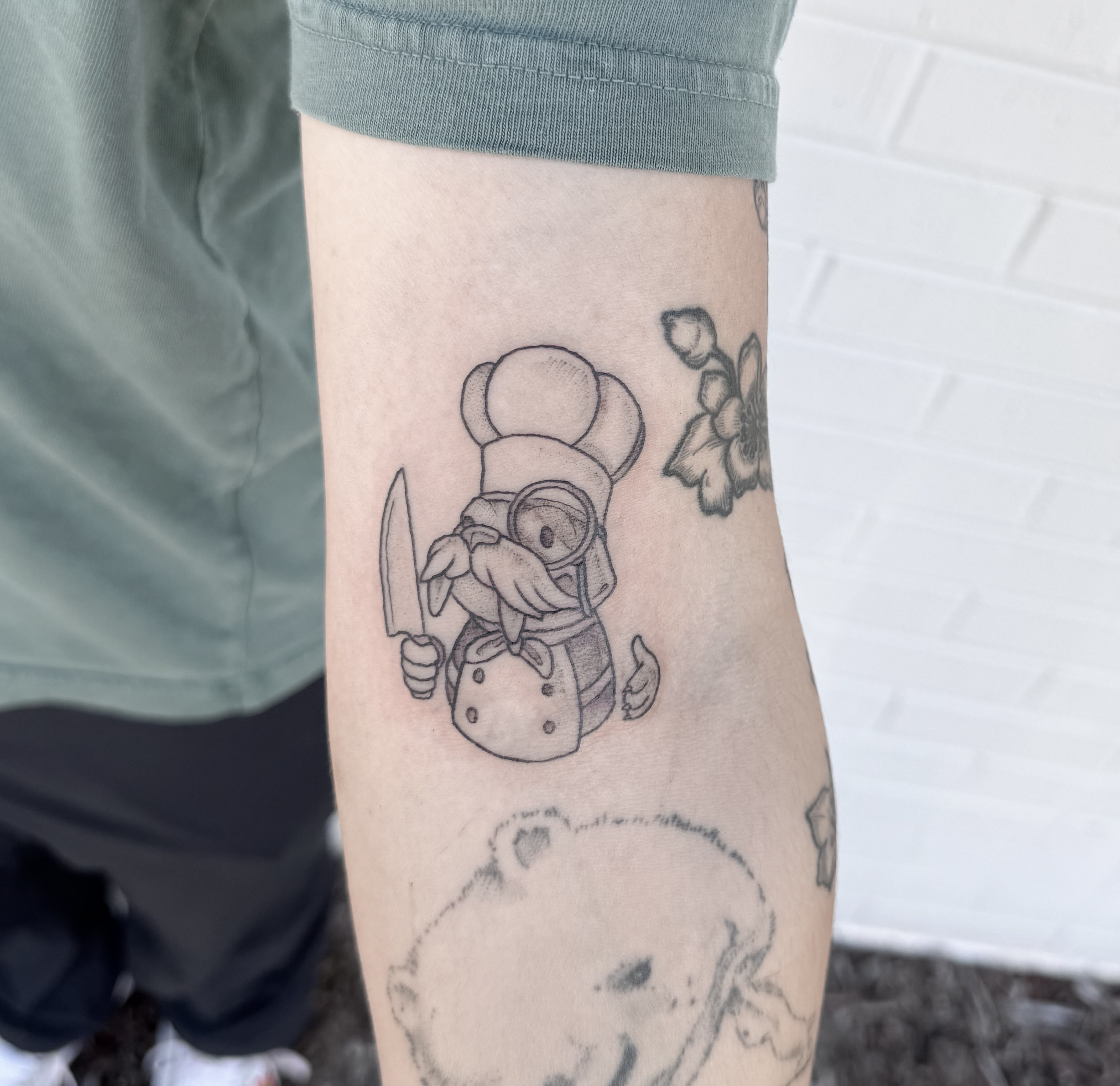 Chef mouse black and grey tattoo on the forearm by Audrey Kacel, Holland, Michigan