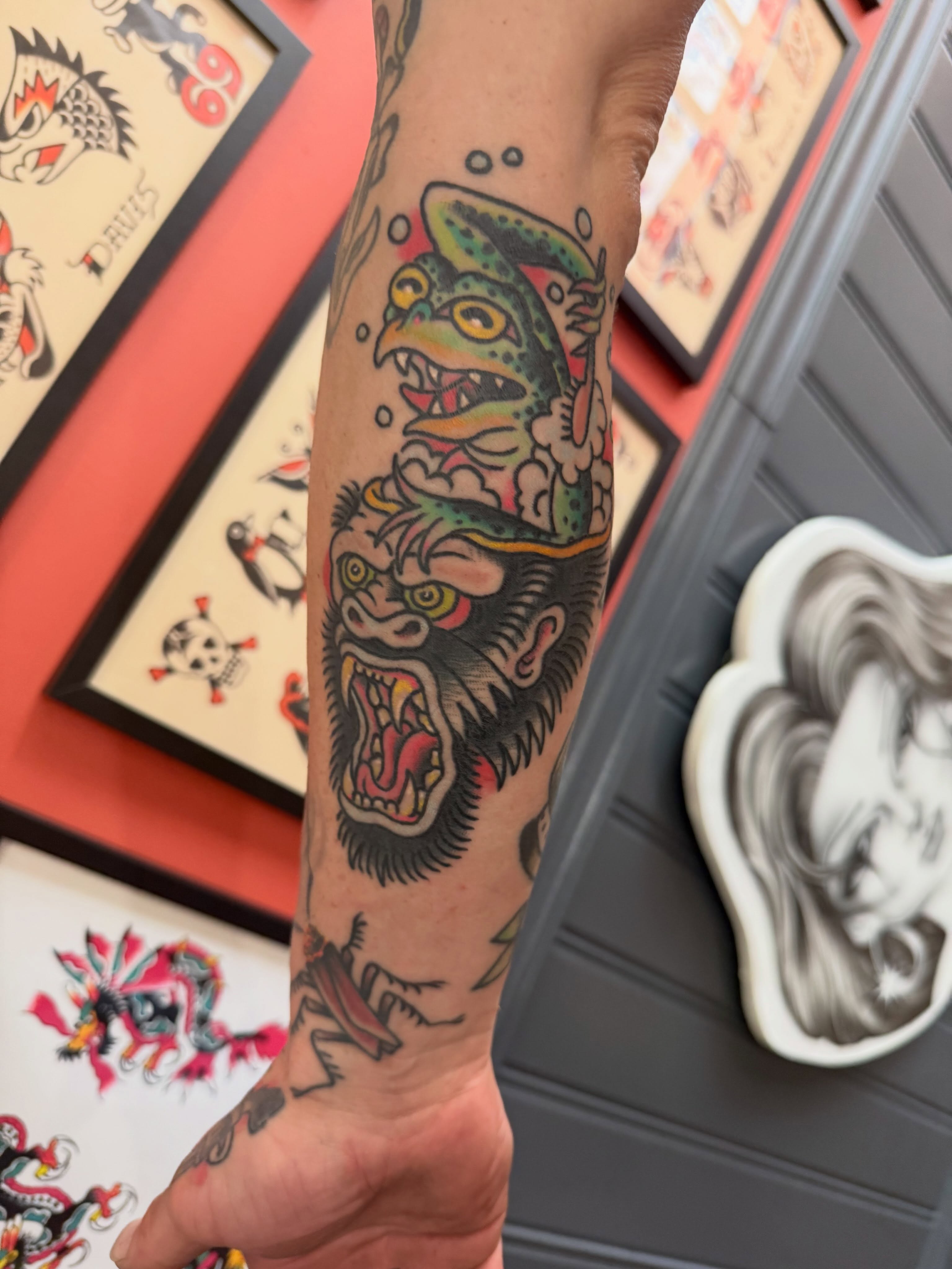 Angry animal American traditional tattoo on the forearm by Cody Dalton