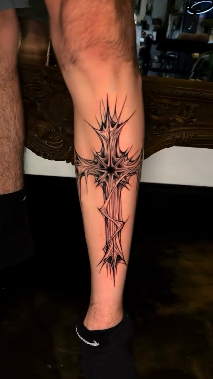Gothic cross blackwork tattoo by Sergio Ramirez