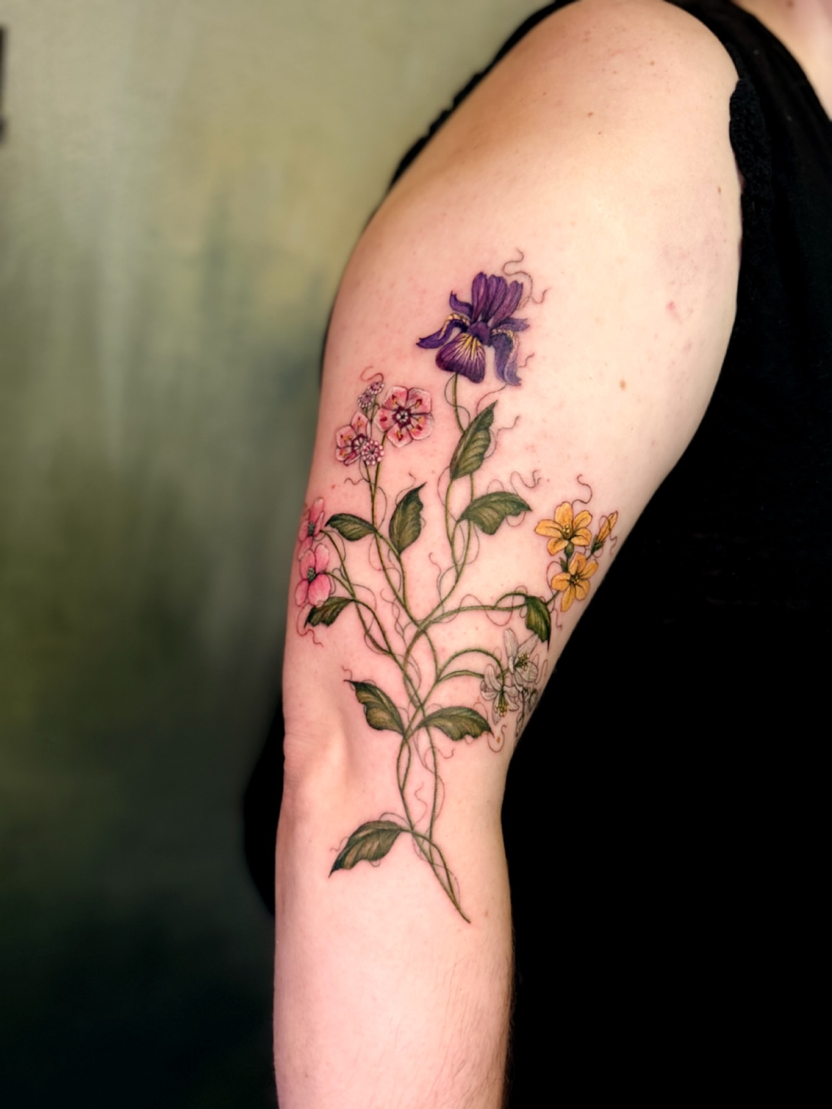 Floral vine realism tattoo on the forearm by Natasha Rachel Fineline Tattoos Nashville