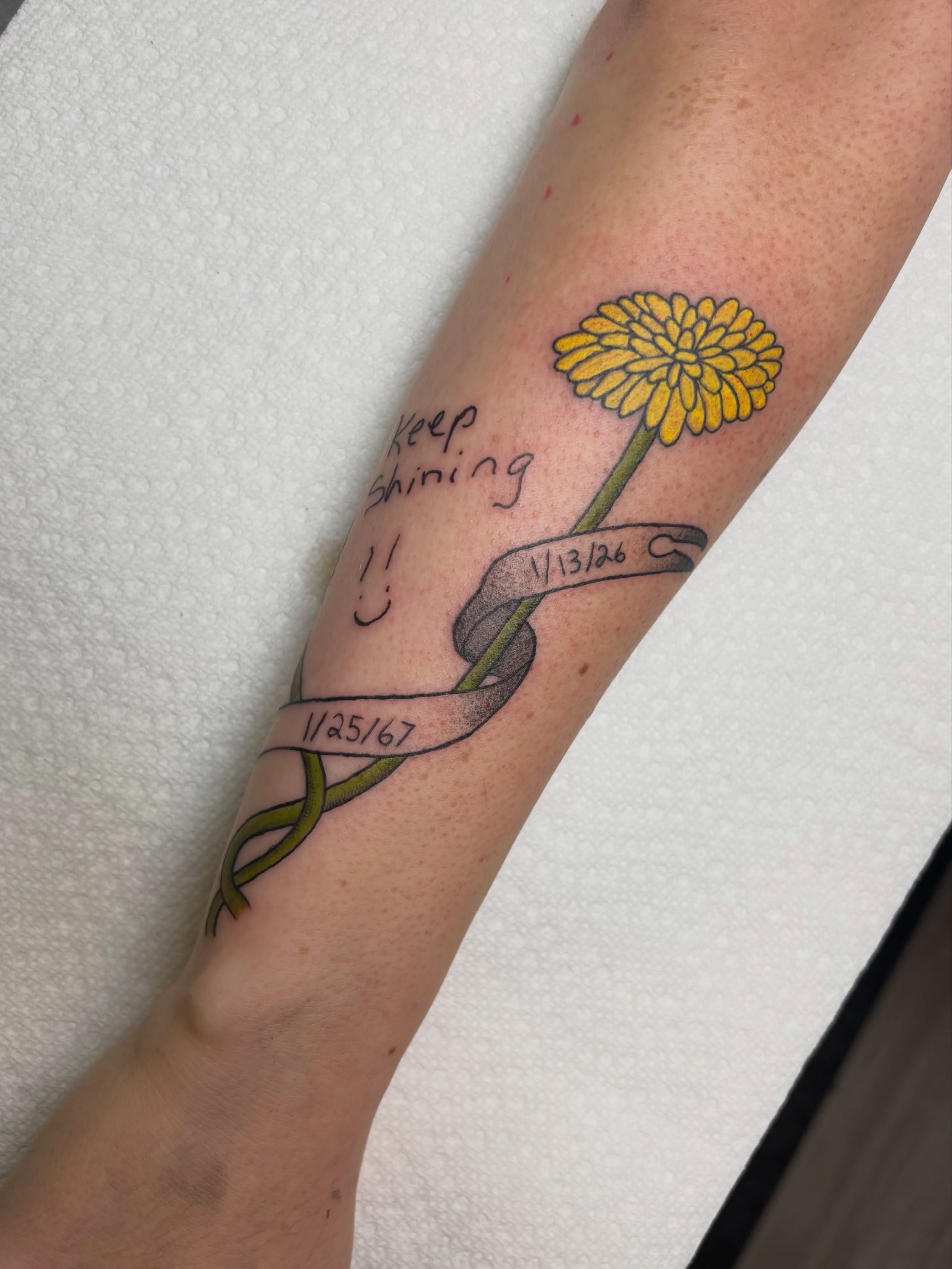 Yellow flower with ribbon dotwork tattoo on the forearm by ππ‘ππ―π² πππ₯π₯ππ²