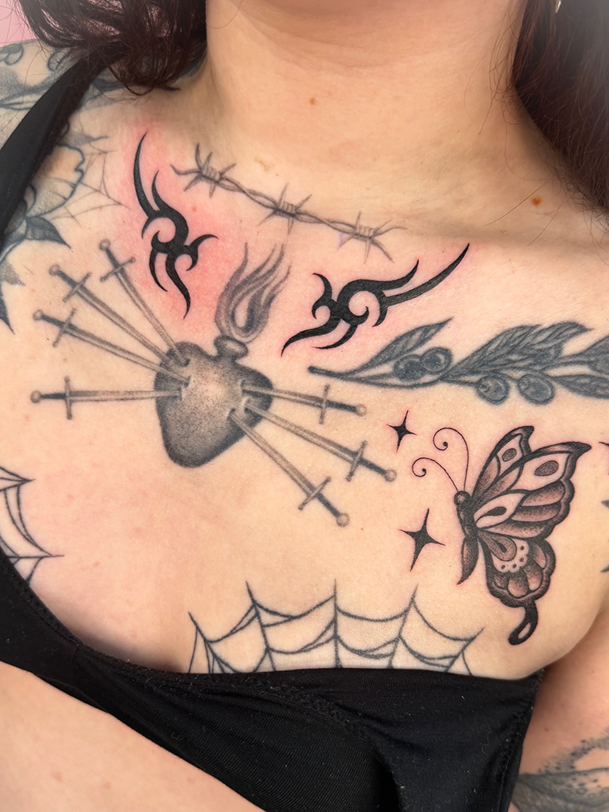 Heart with swords tribal tattoo on the chest by ☆ Sammy ☆