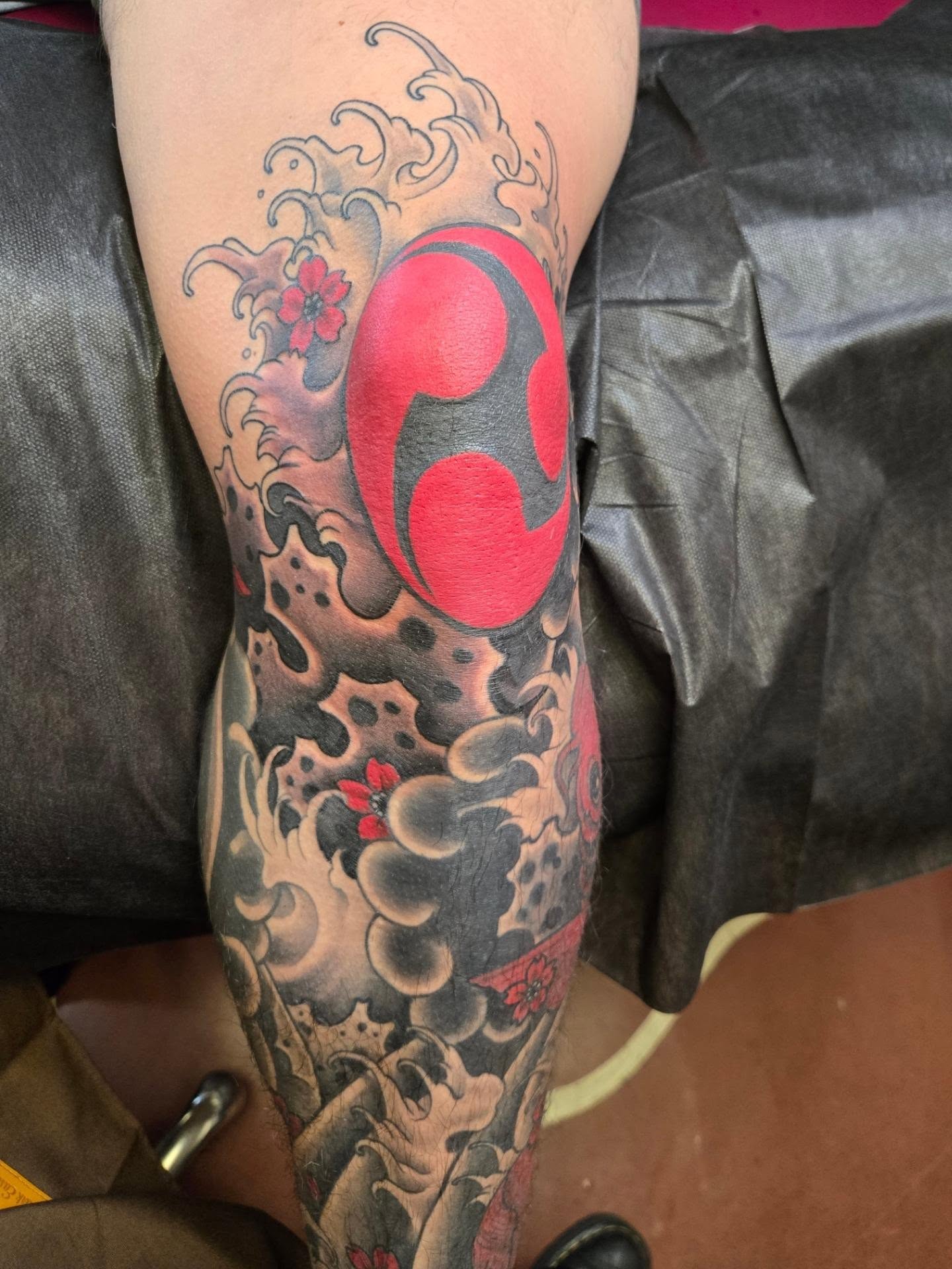 Red and black swirl japanese irezumi tattoo on the forearm by Irma π€β¨, Las Vegas, Nevada