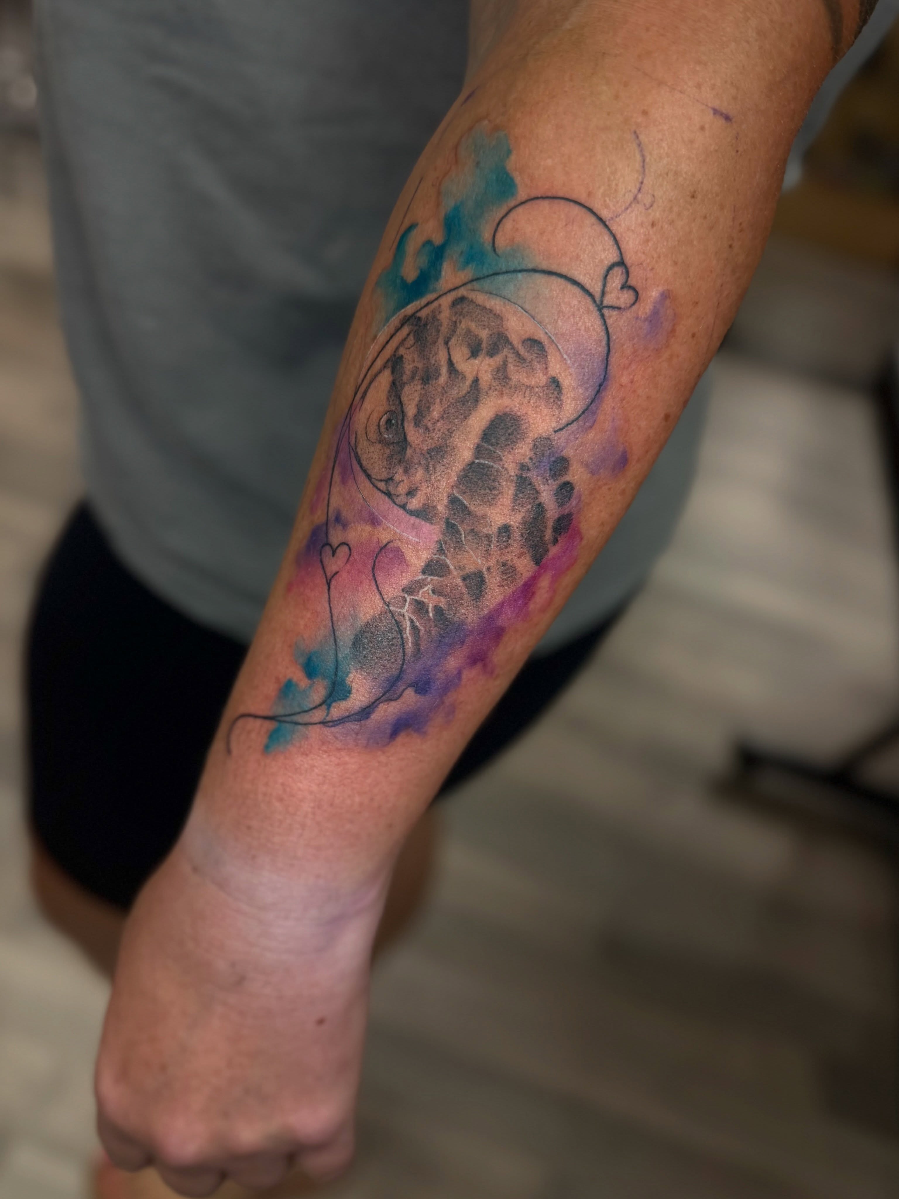 Giraffe dotwork tattoo on the forearm by Ray De Leon