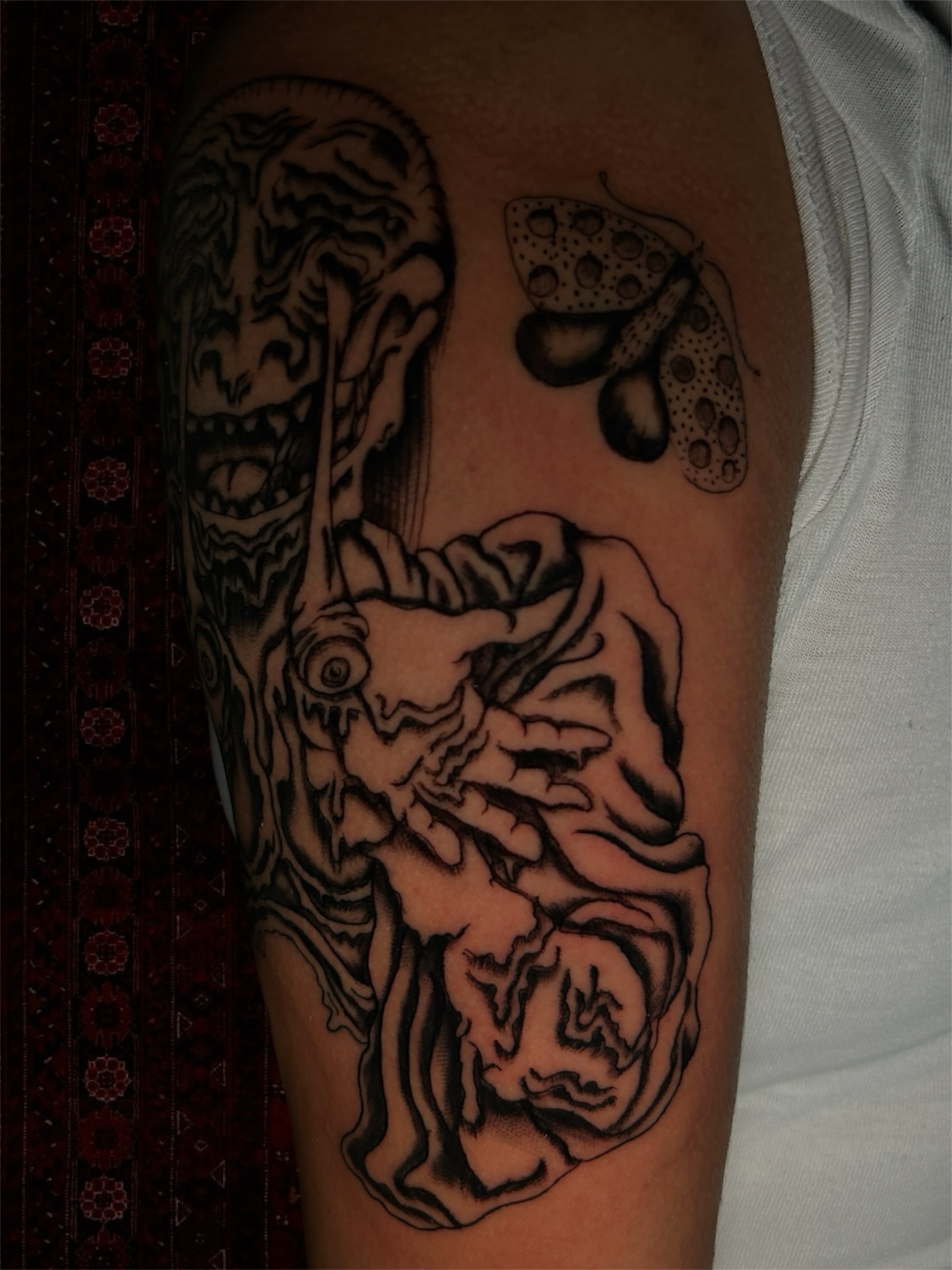 Monster and butterfly dark realism tattoo on the forearm by ⁂ 𝕽𝖊𝖆𝖌𝖆𝖓⁂, Texas City, Texas