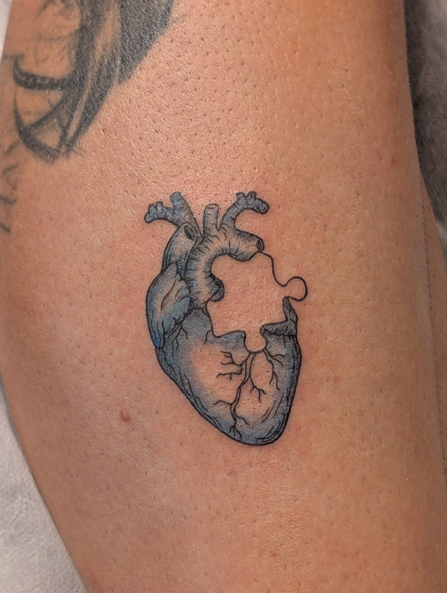 Heart realism tattoo on the forearm by Nenookaasi Martin